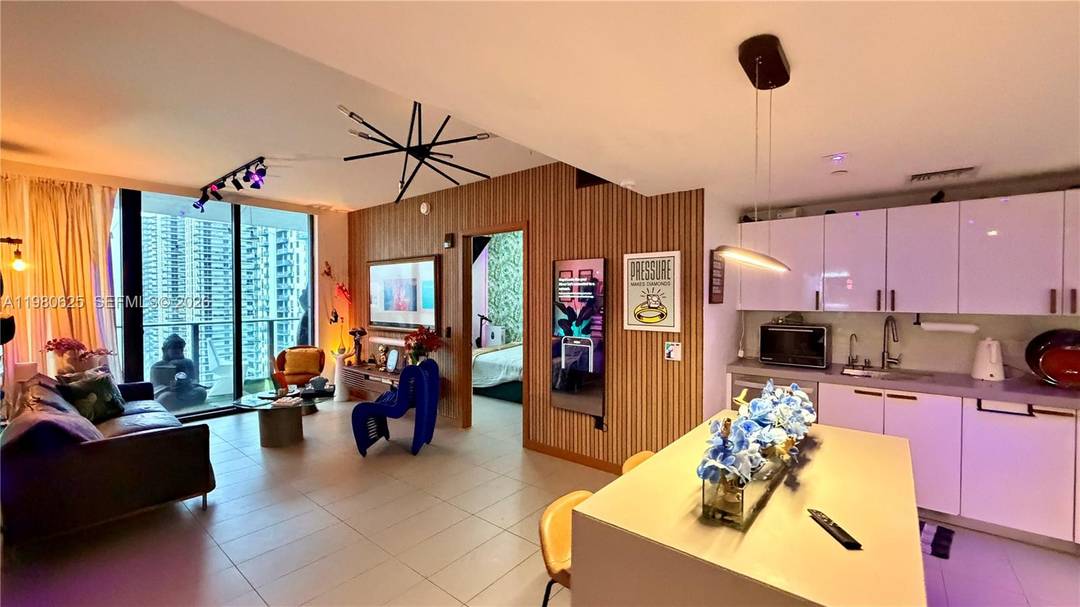 Turnkey 2 bedroom, 2 bathroom residence with spectacular bay and city views from a large private balcony.