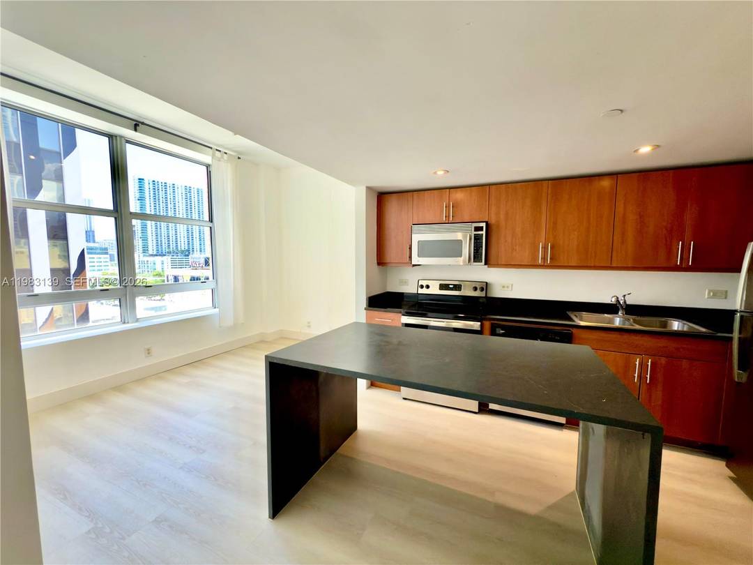 Rented, income producing turn key investment property in the heart of Downtown Miami !