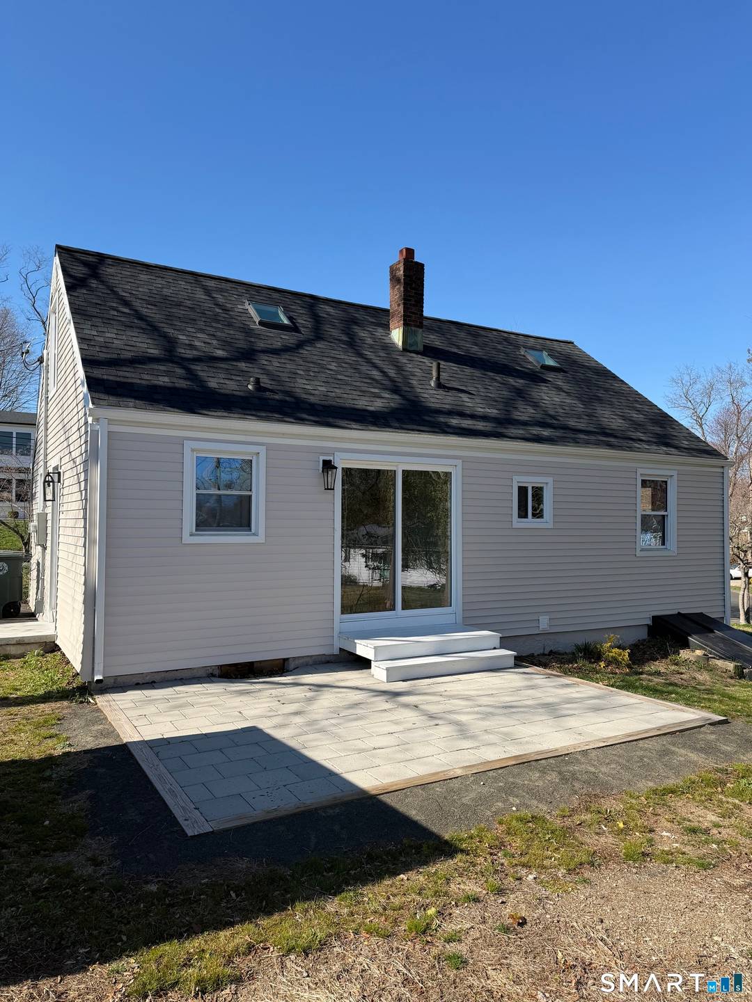 Discover this stunningly renovated Cape Cod home, perfectly situated on a desirable corner lot.