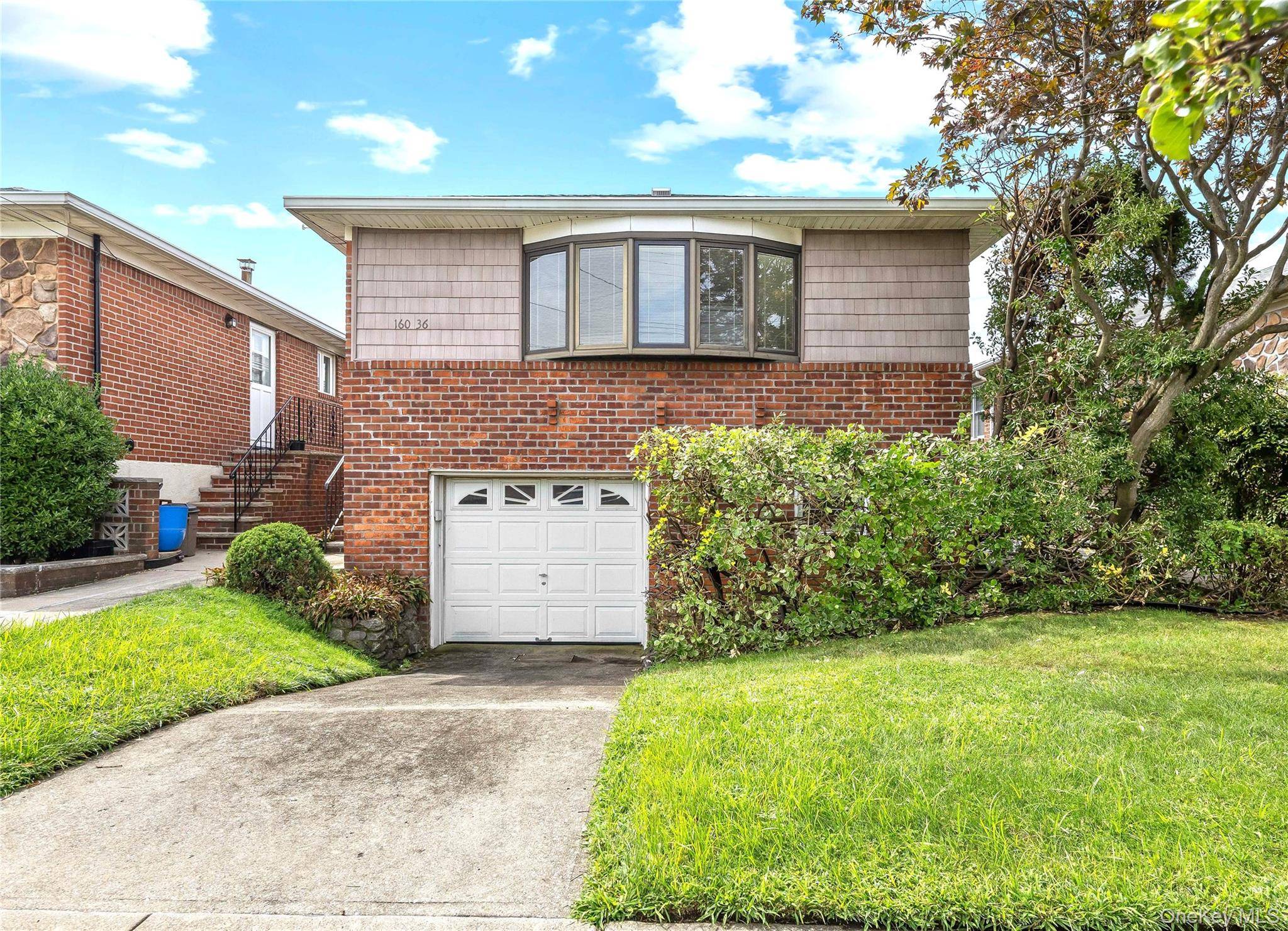 Detached Brick Raised Ranch In Move In Condition.