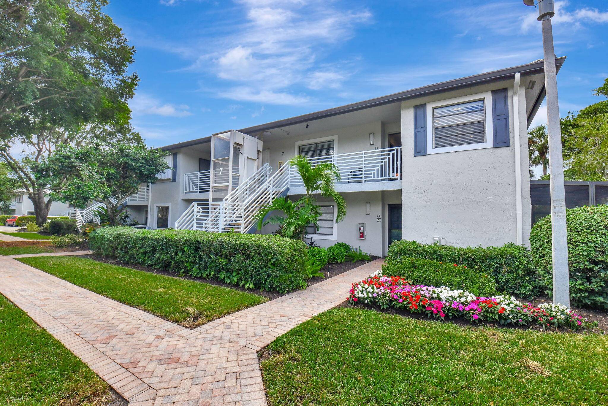 Beautifully updated second floor, two bedroom, two bath residence in Hunters Run Country Club.