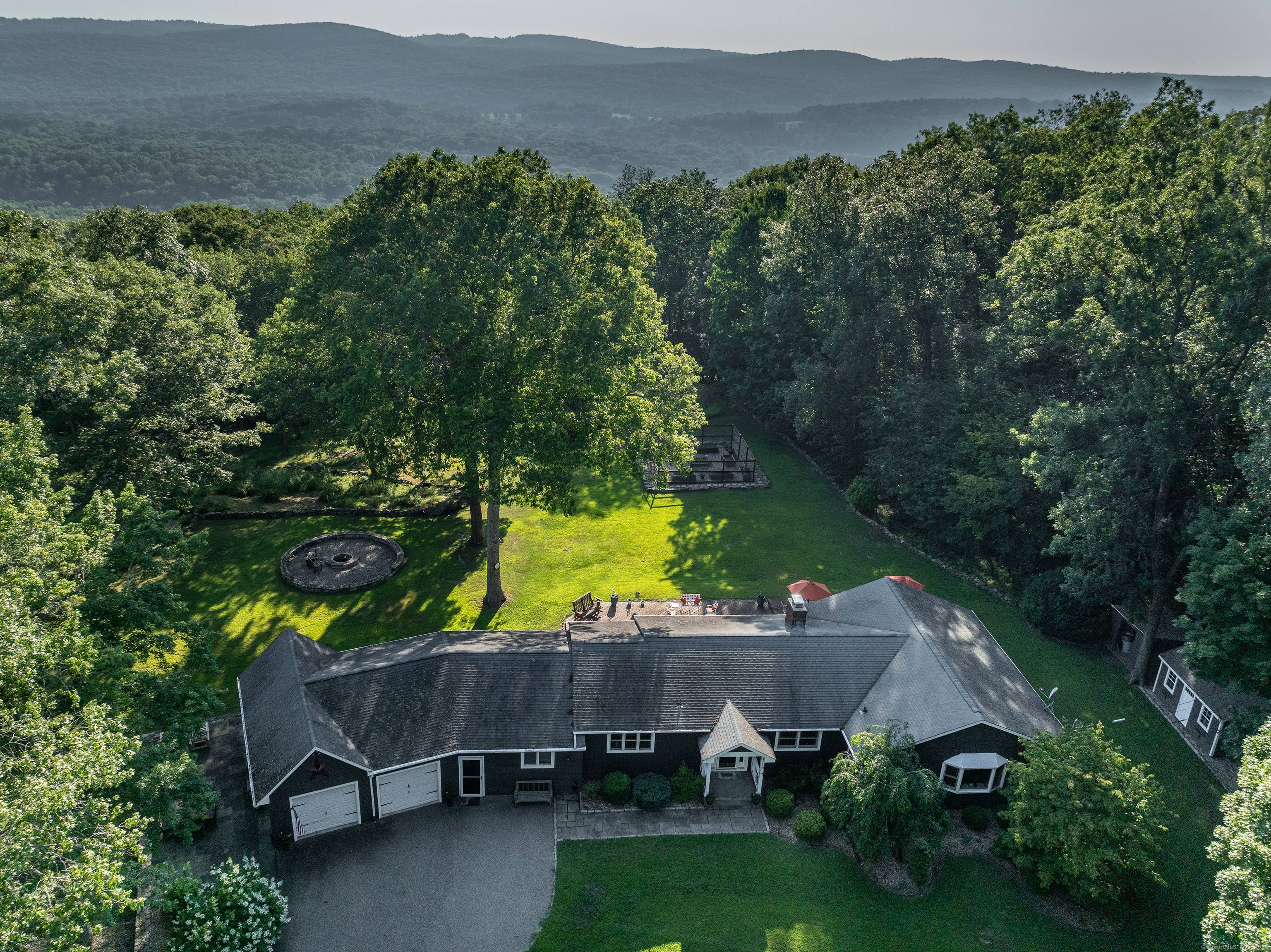 Set along a scenic country road with sweeping views of the western hills, this beautifully renovated ranch offers the rare ease of single level living and is situated on nearly ...