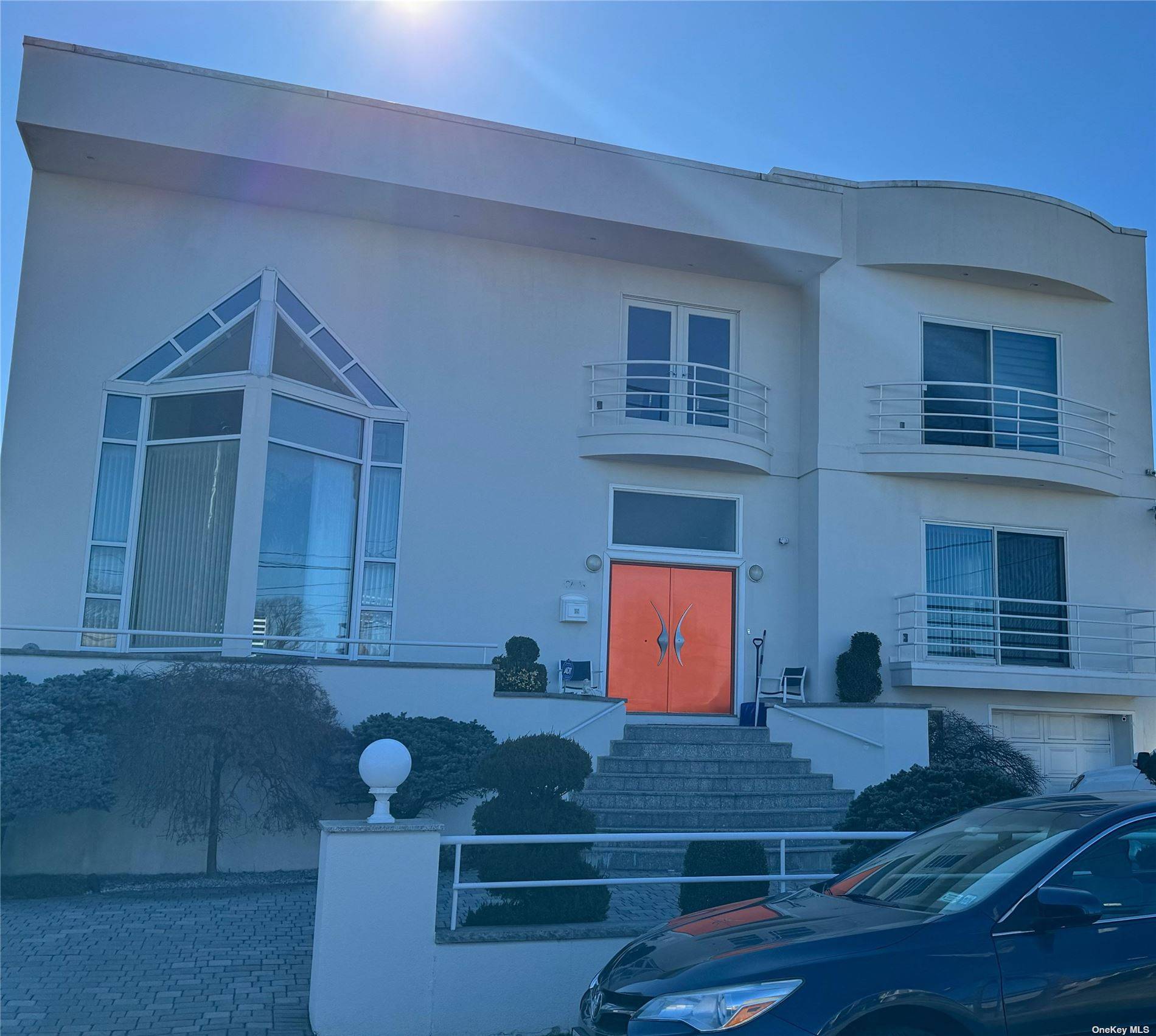 completly rebuilt 1999, Exceptional one of a kind Hollywood contemporary home located on the Queens Nassau border in Bayside.