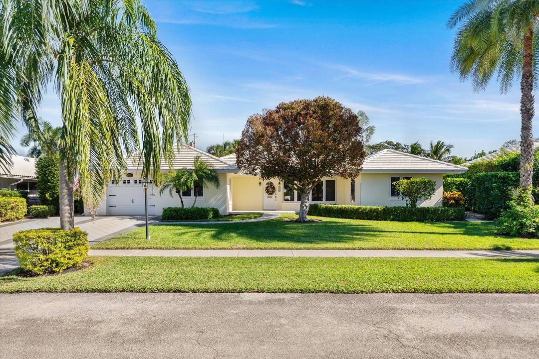 Welcome to this exceptional Andover model home in the desirable Camino Gardens of Boca Raton, FL.