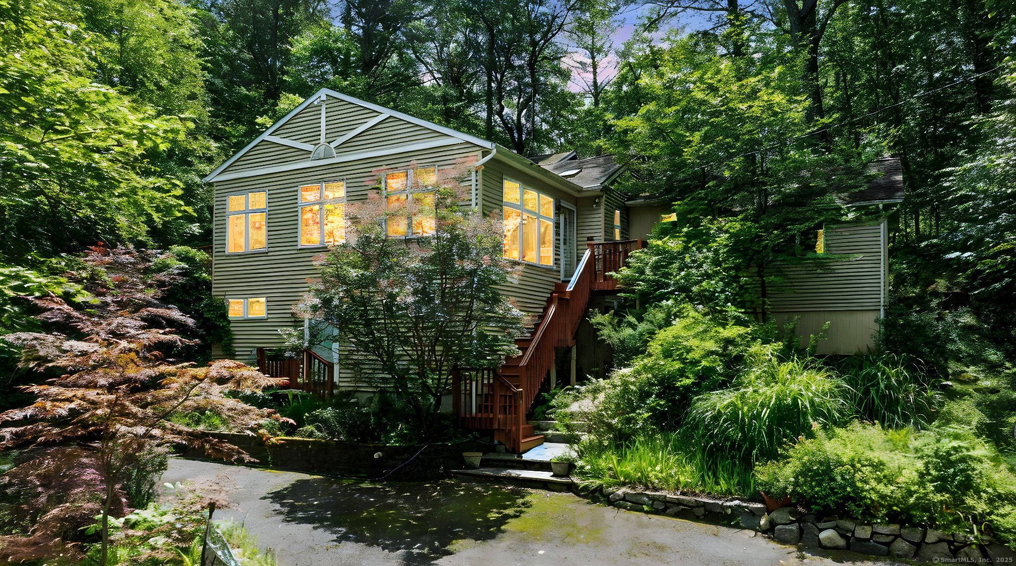 Tucked away in a peaceful, gated lake community, this endearing home offers a lifestyle of comfort, connection, natural beauty.