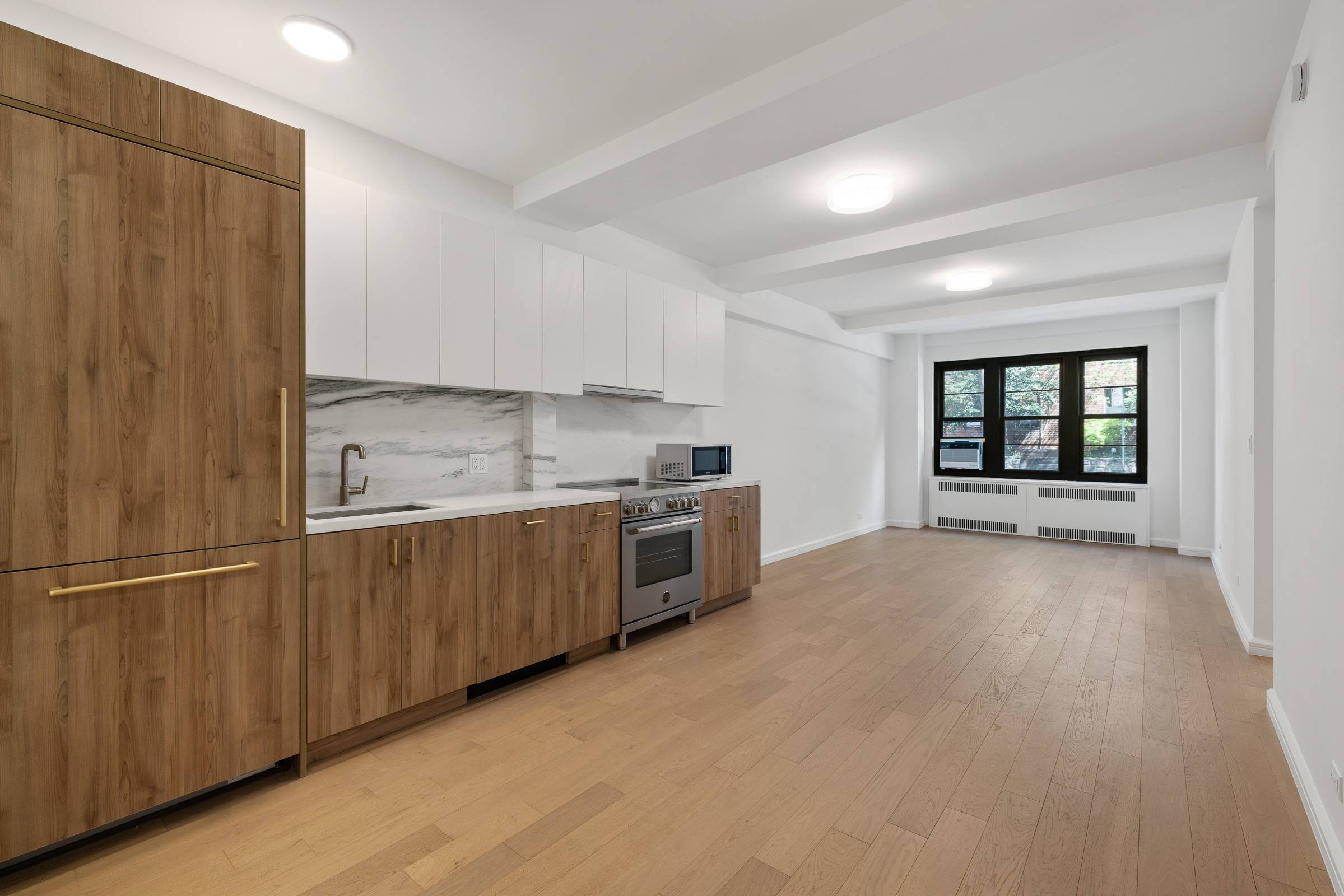 Oversized 2 bedroom, 2 bathroom featuring modern finishes, custom marble features in bathrooms, chef s kitchens with integrated stainless steel appliances, ample closets, wide oak plank flooring and plenty of ...