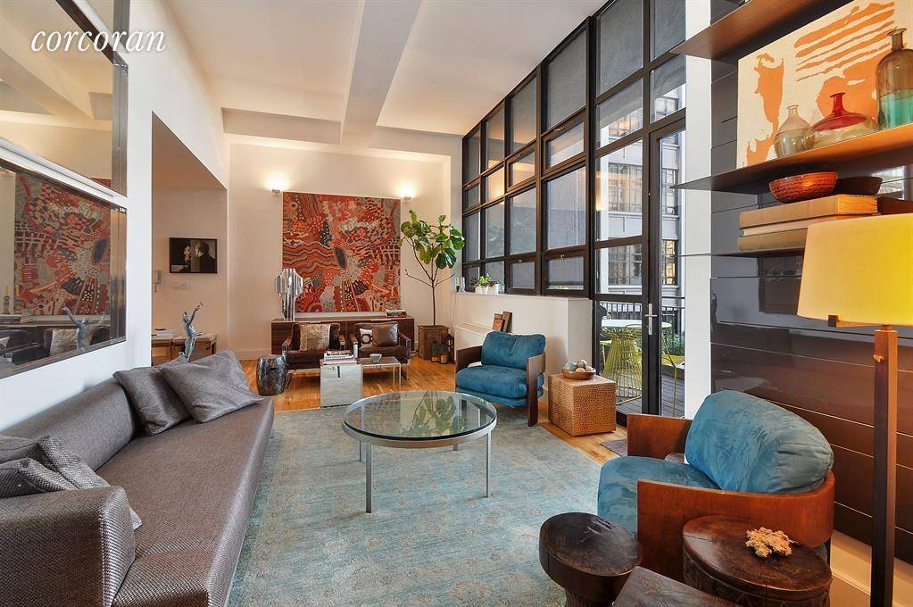 PRIVATE TERRACE amp ; OPTION TO RENT A PRIVATE PARKING SPOTStunning 2 Bedroom 2 bath approx 1466 s f designer condo Loft home with 115 sf private terrace OBBP.