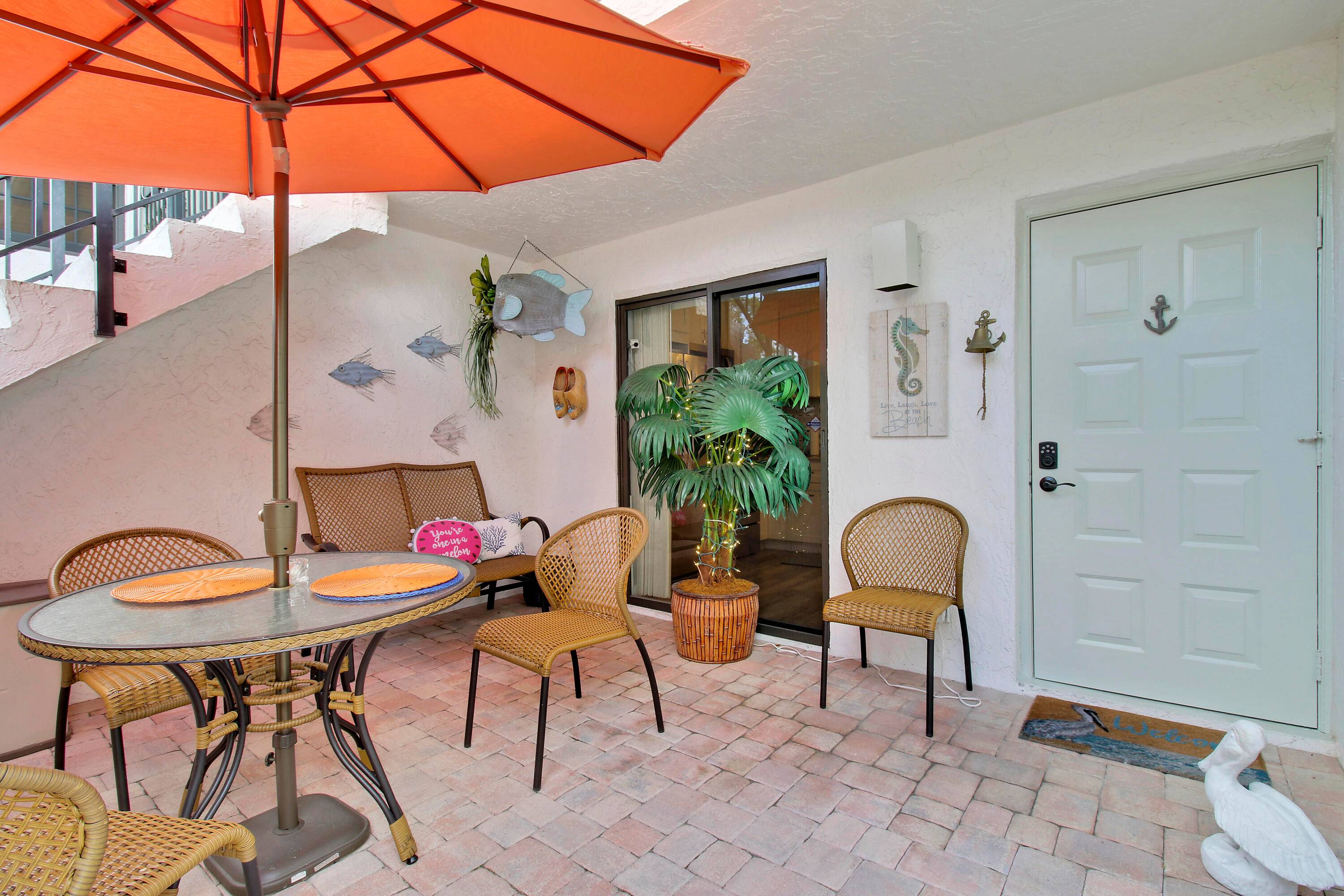 Experience the best of East Delray living in this rarely available, beautifully renovated first floor condo !