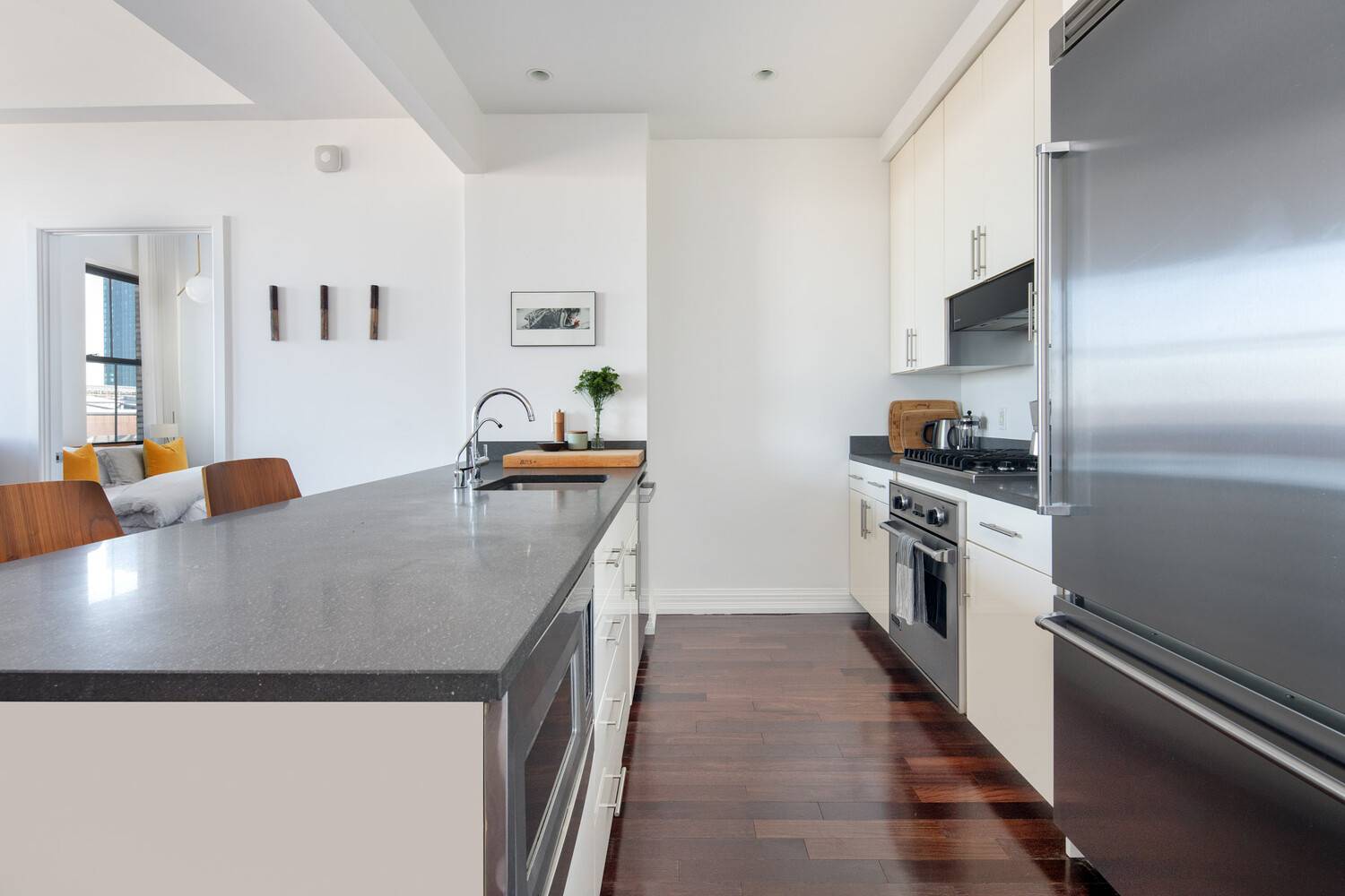Welcome to Residence 23B, a beautifully proportioned two bedroom, two bathroom loft style home in one of Brooklyn's most iconic landmark buildings One Hanson Place.