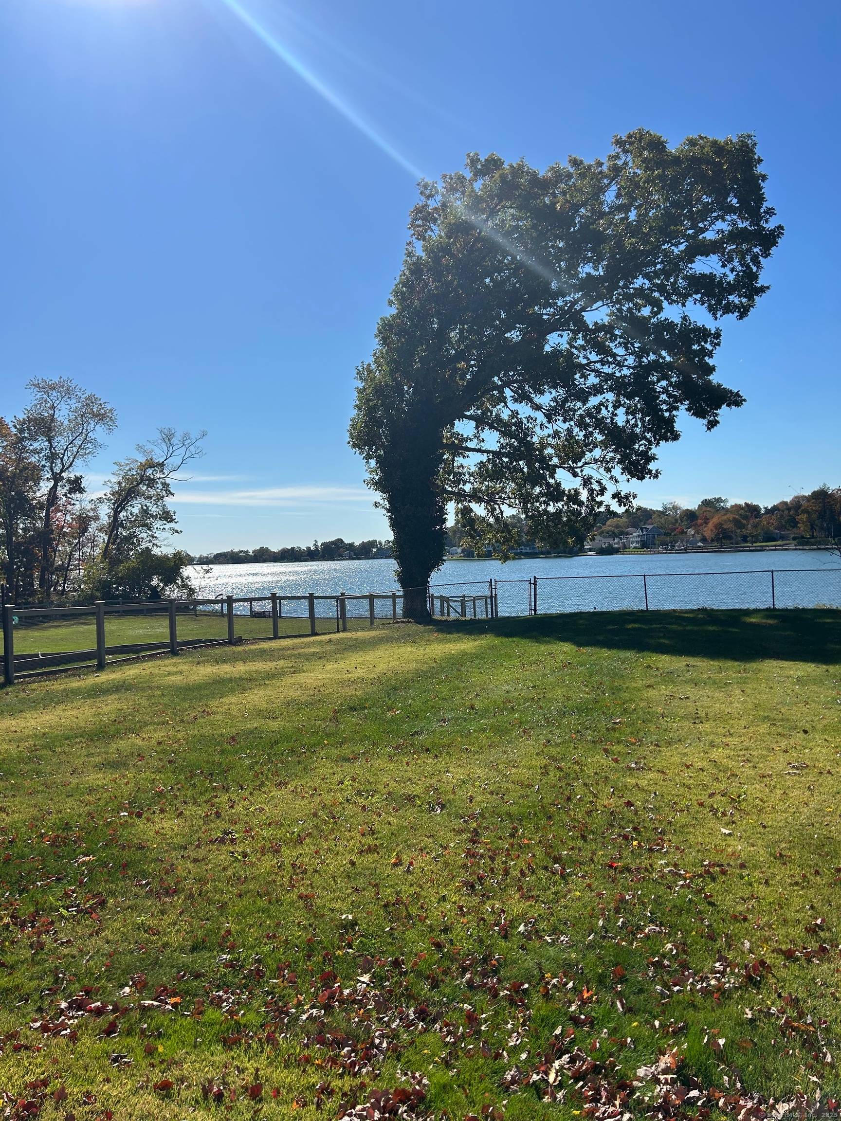 Fantastic waterfront location on Holly Pond in desirable Darien, CT.