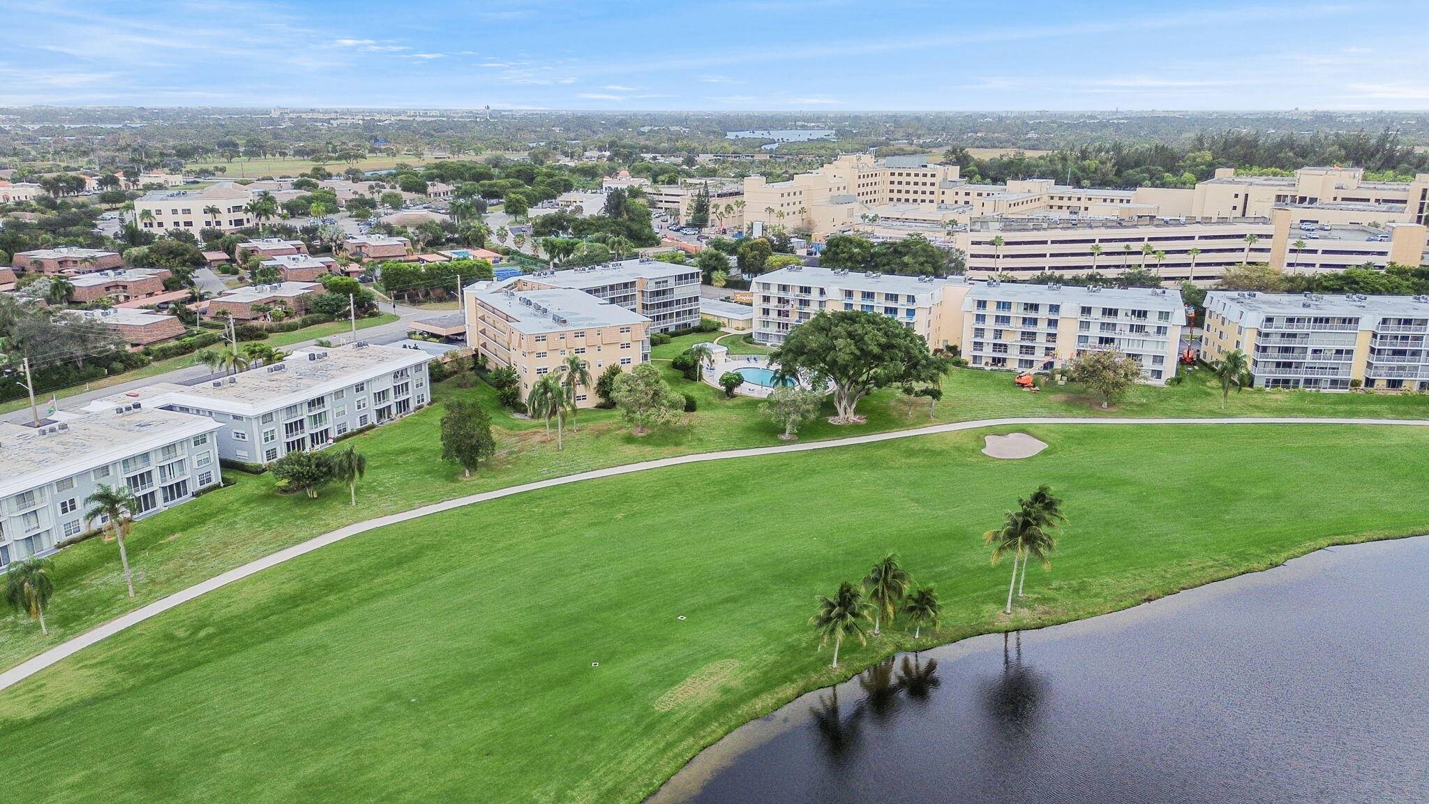 Experience serene living in this inviting 3 bedroom end unit condo, perfectly positioned to offer peaceful fairway and water views.