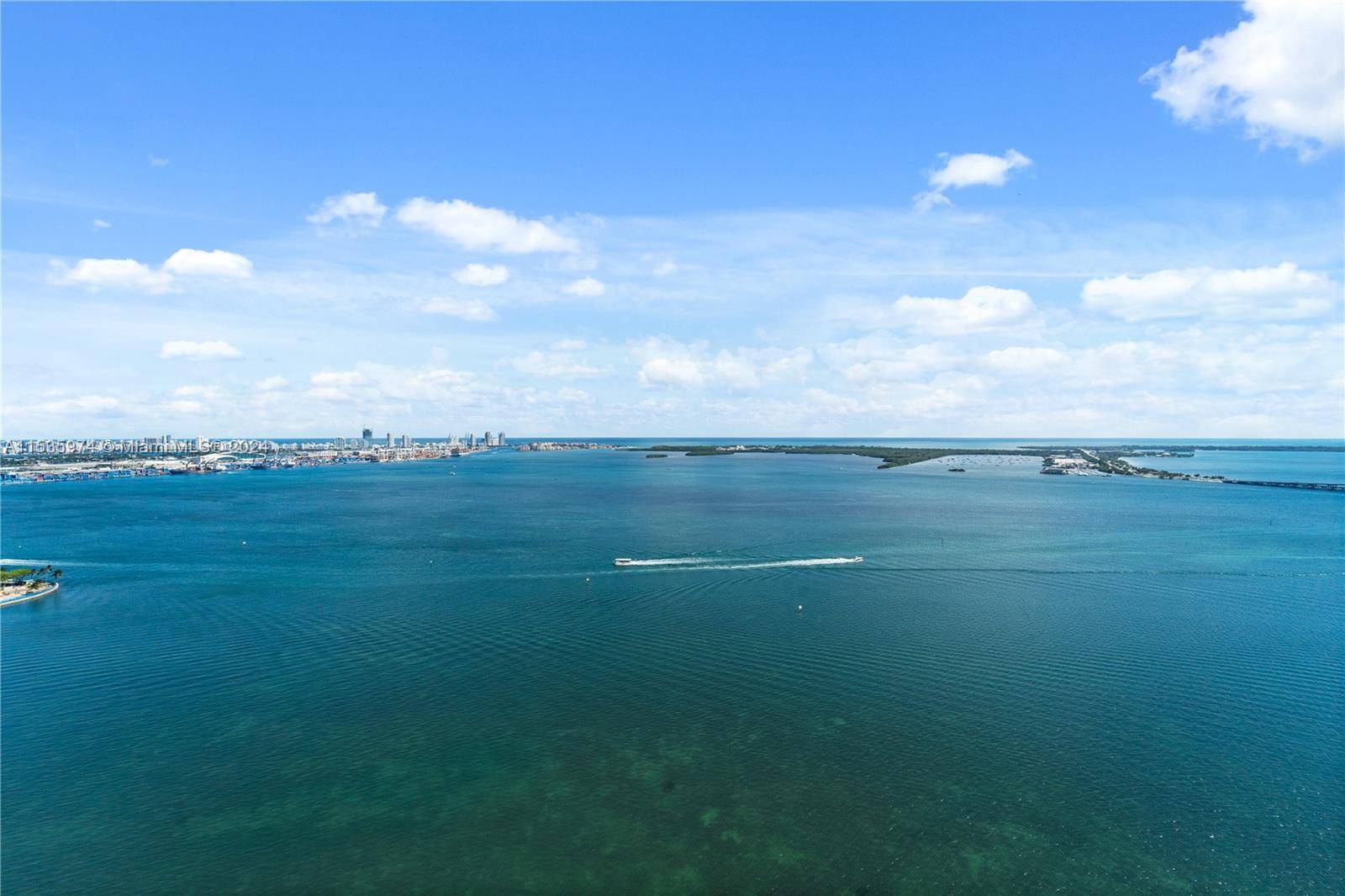 Priced to sell ! Tessi Garcia designed turnkey 2 Bed Den 3 Bath with breathtaking water views located right on the bay in the heart of Brickell.