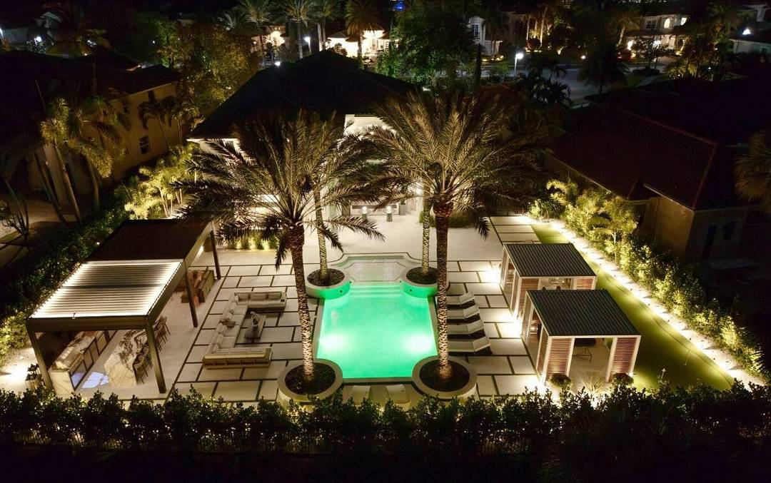 Experience resort style living in this fully redesigned, move in ready, opulent luxury estate within the prestigious Jupiter Country Club.