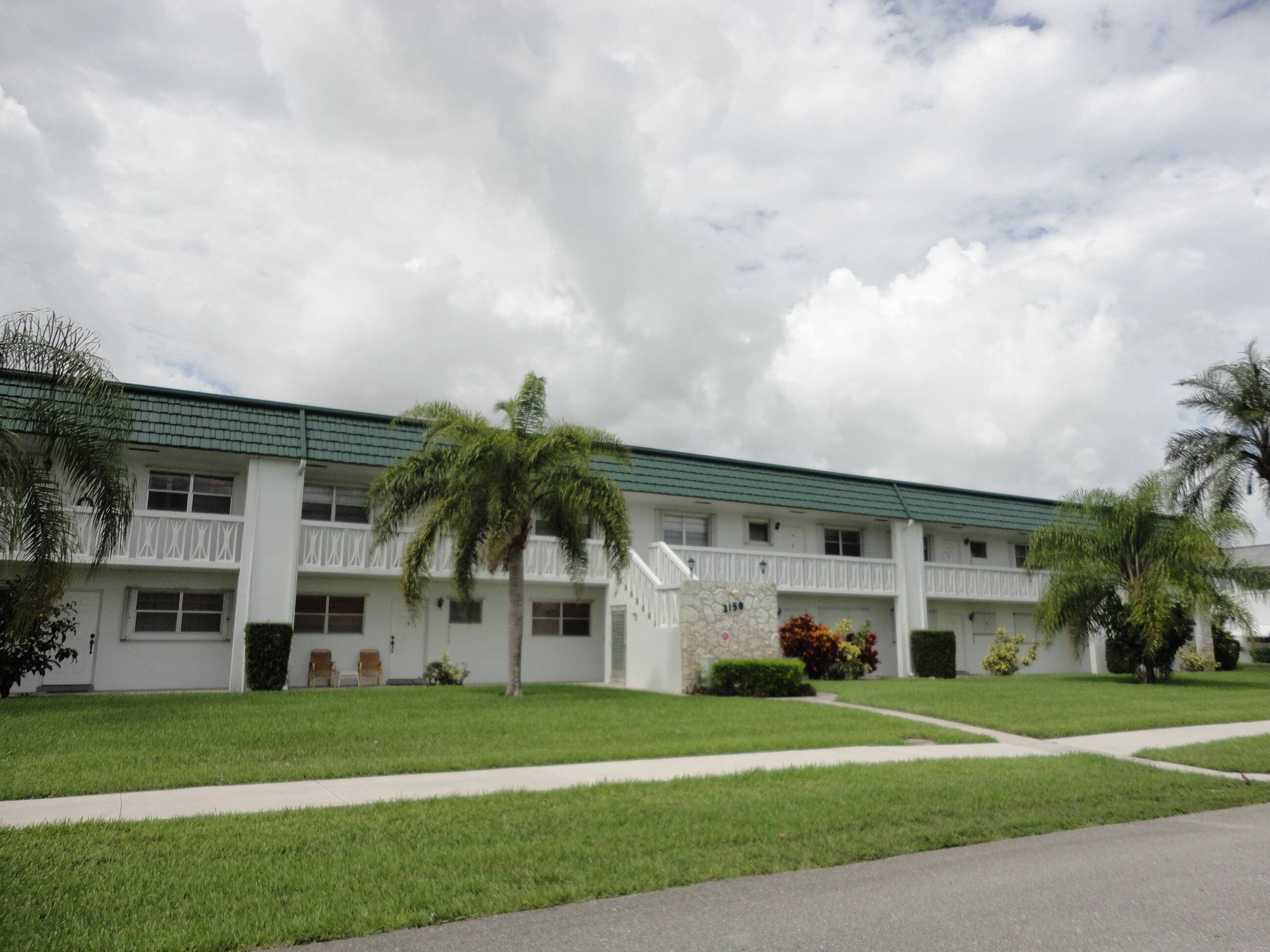 This home boasts an end unit with inside laundry and a carport space close to back door.