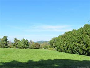 Level, open 1. 66 acres with views to the Berkshires in a desirable area of attractive homes.
