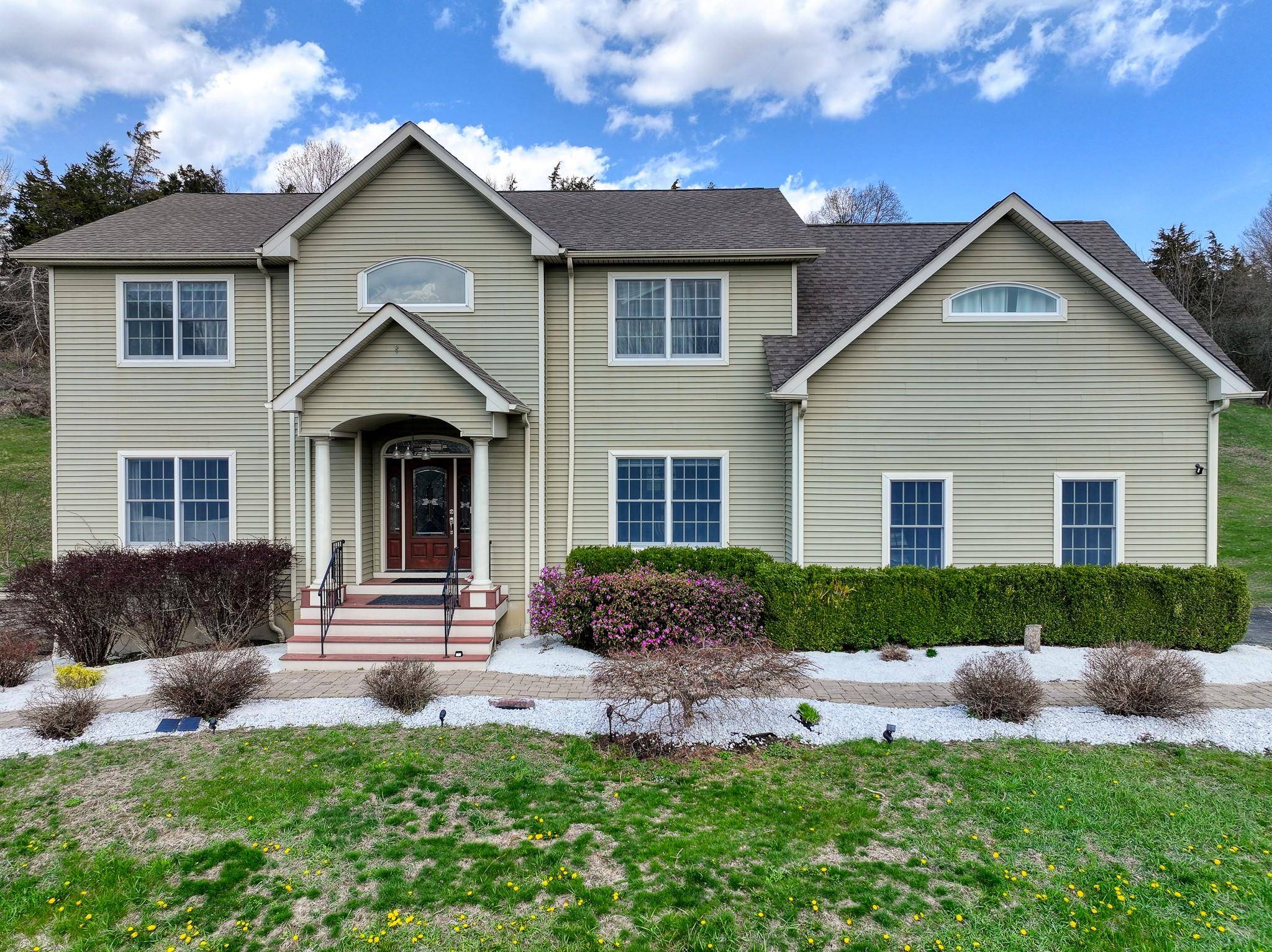 Timeless Elegance, Modern Comfort with Tranquility, Views, and Income Potential Welcome to this extraordinary custom built Colonial, offering just under 5K sq' of beautifully appointed living space and perfectly situated ...