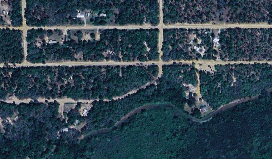 This versatile. 32 acre property offers the perfect space for your dream home or small agricultural project.