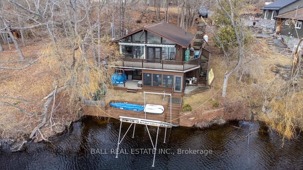 Stoney Lake Shangri La. Excellent weed free frontage with four season home cottage all on southern exposure.