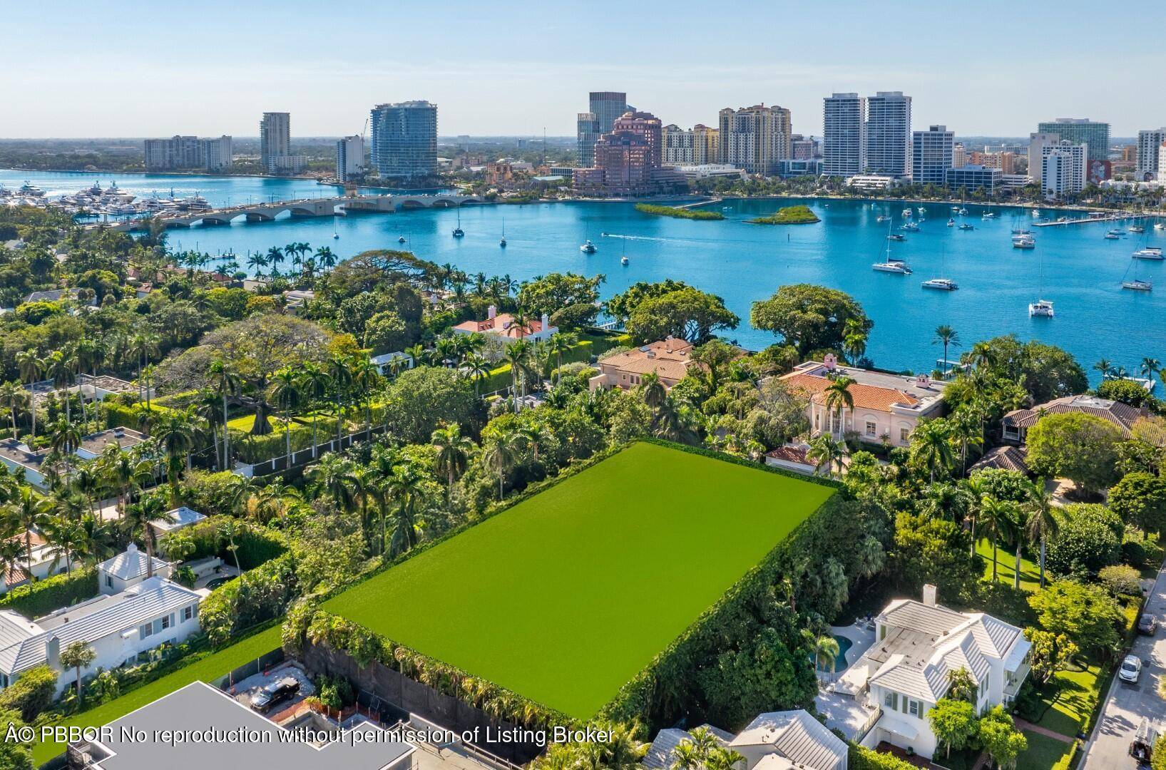 Fantastic In Town Estate on oversized 1 acre lot, just one house from the Lake Trail.