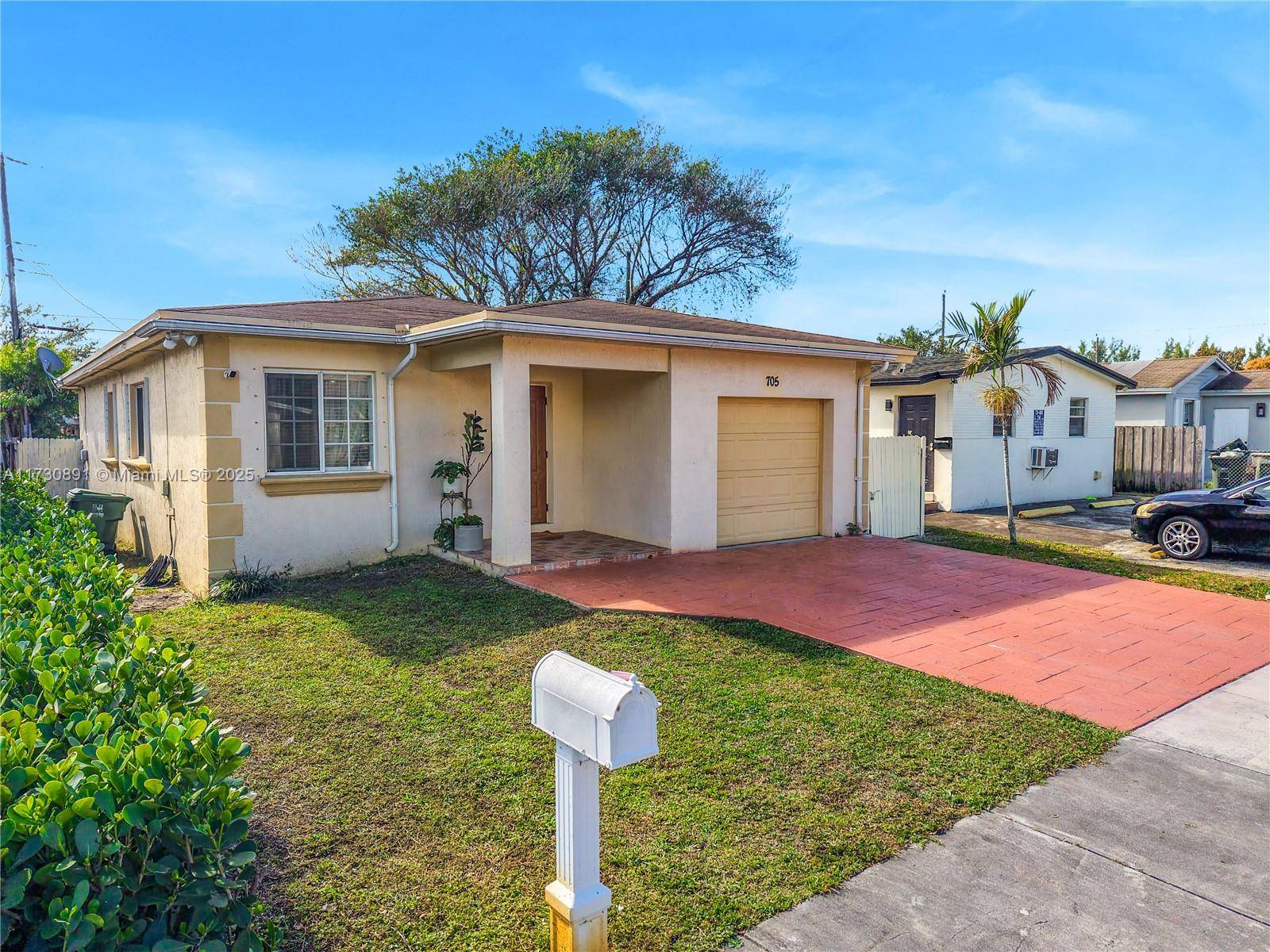 This charming 3 bedroom, 2 bath home features a spacious layout, 1 car garage, and a large backyard perfect for relaxing and or entertaining.