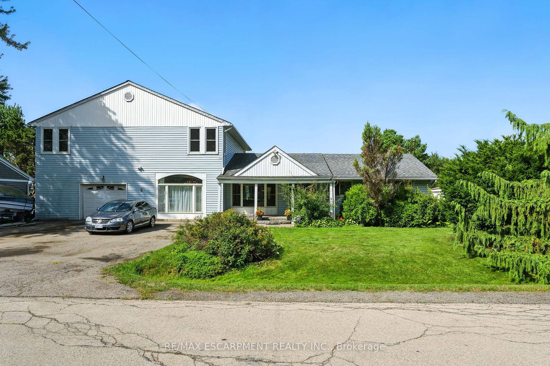 Bring your vision and creativity to this incredibly spacious and unique two storey home on a premium 100' x 150' lot backing onto open fields !