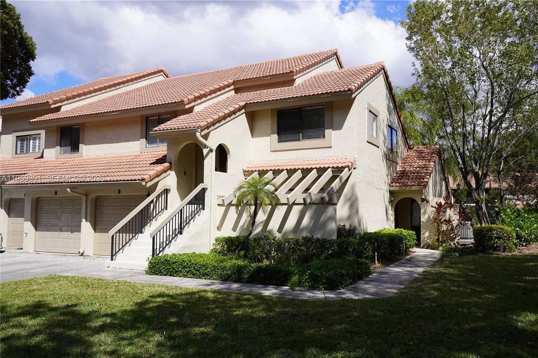 Experience modern luxury in this meticulously upgraded residence at The Coach Houses of Town Place.