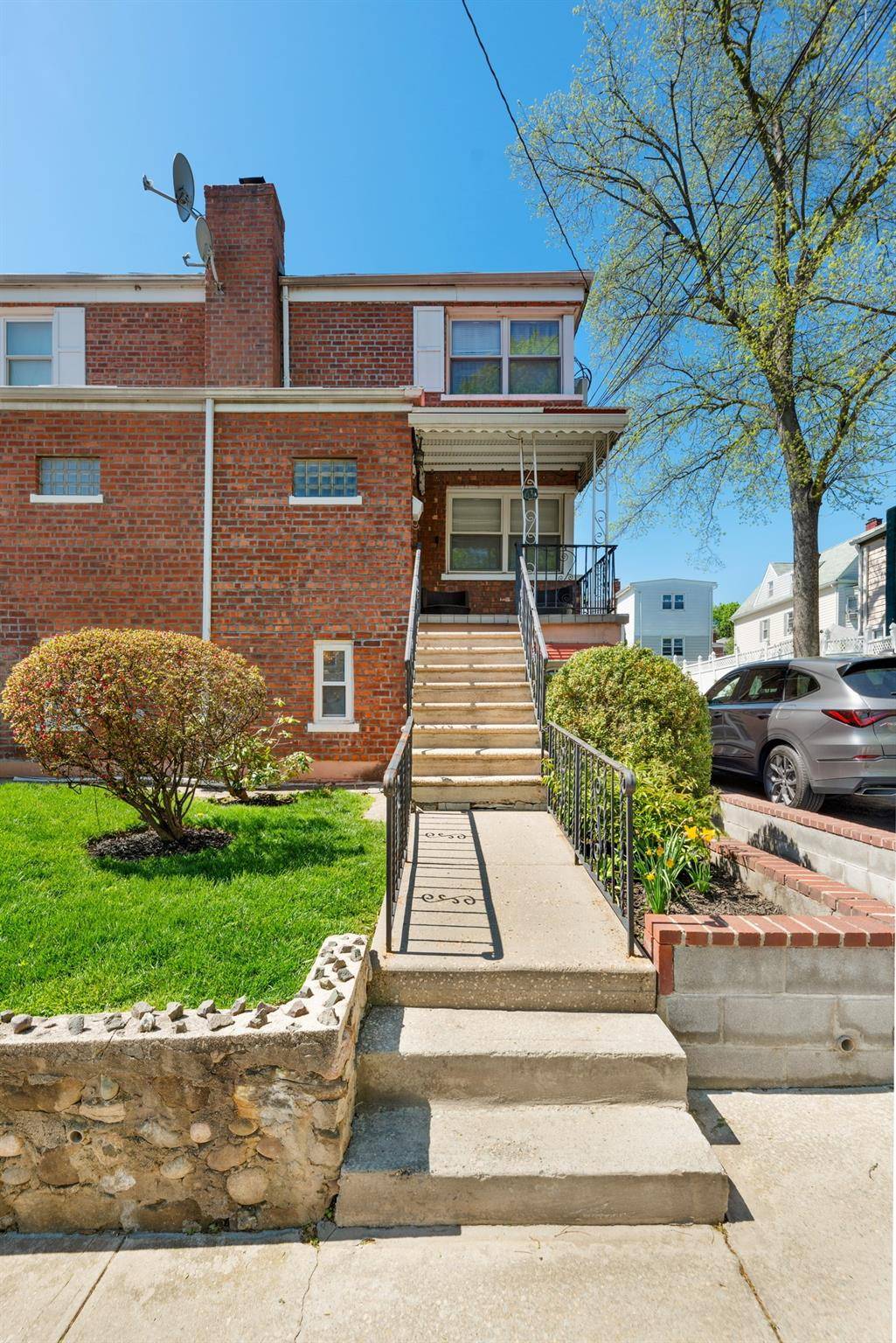 Absolutely stunning, meticulously maintained semi detached two family home with a spacious yard and 6 parking spots !