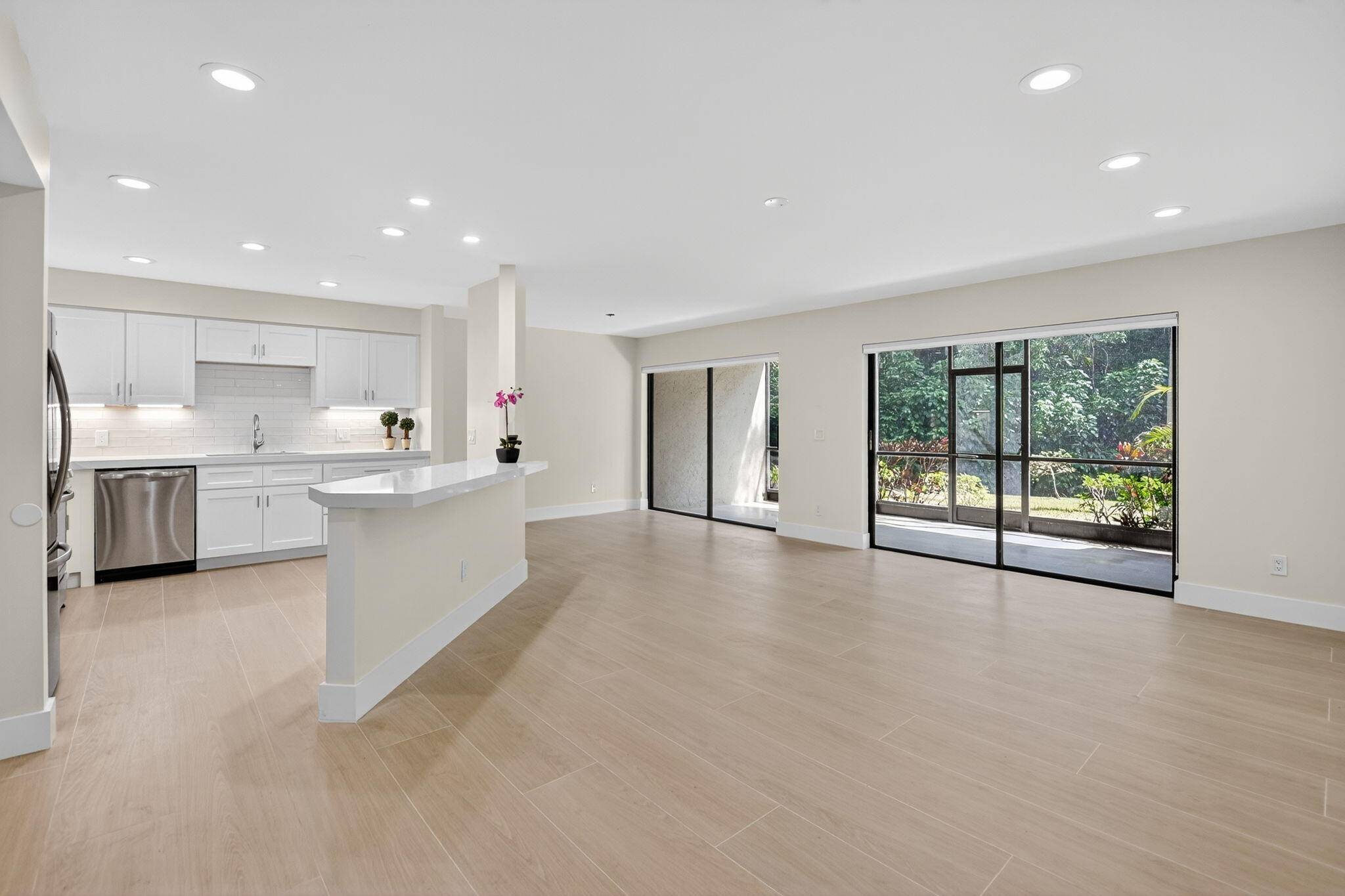 Stunning totally renovated first floor residence situated on a tranquil and peaceful preserve setting.