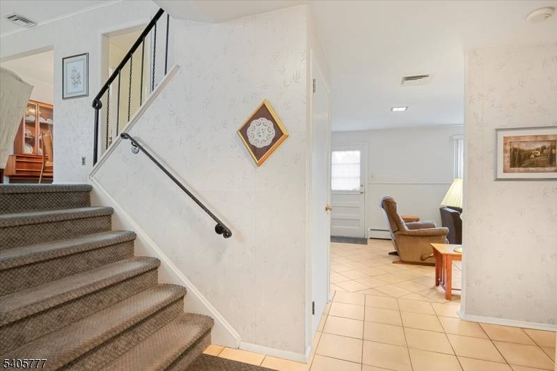 Welcome to this well located split level home in Union's desirable Battle Hill section, offering space, flexibility, and outstanding commuter convenience.
