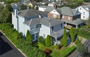Low maintenance 4, 400 sf home w welcoming front porch garage in Central Greenwich.