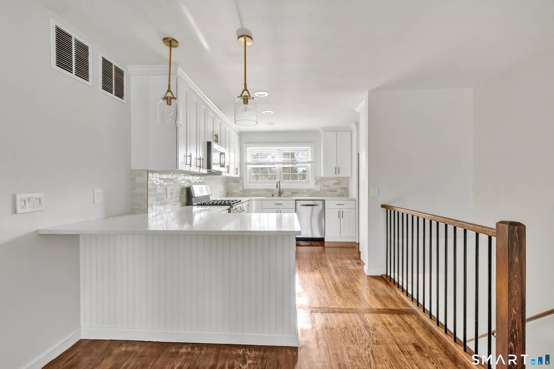 Completely remodeled Mosswood condo offers modern comfort effortless living !