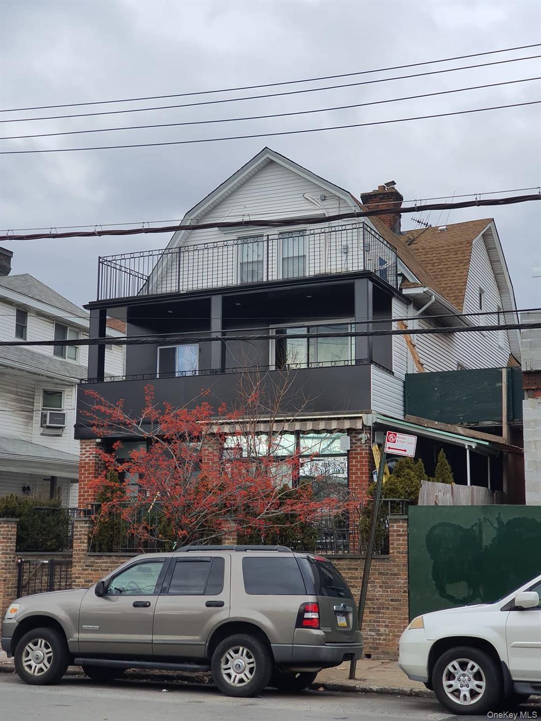 Beautiful fully renovated, detached 3 family home offering high end finishes and excellent income potential in a prime location.