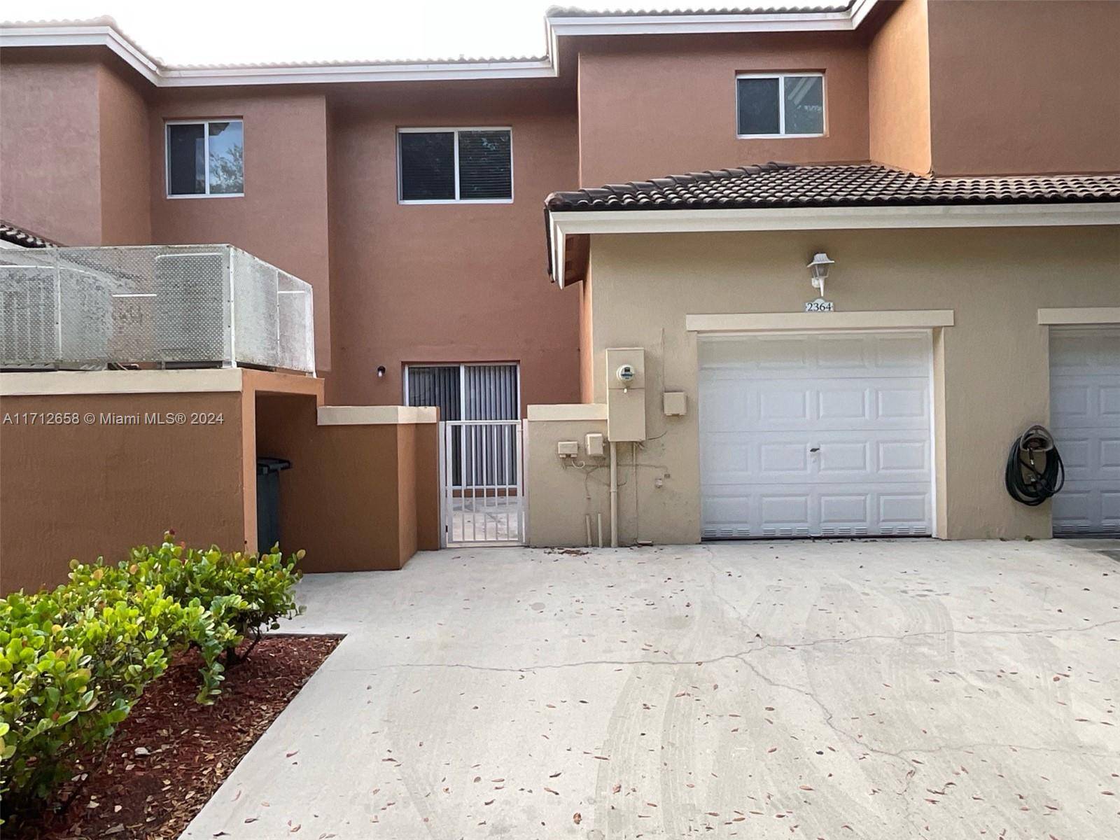 Welcome to this charming 4 bedroom, 3 bathroom home located in the desirable community of Cali Greens.
