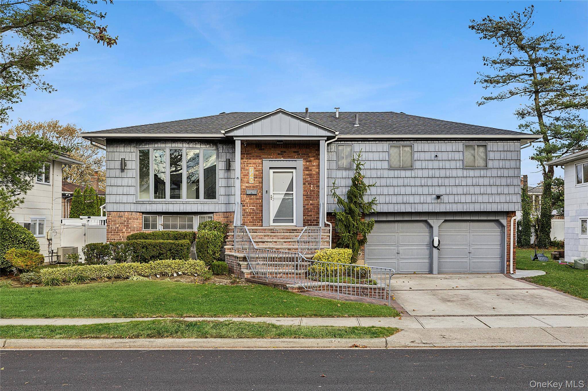 Welcome to 740 Eagle Dr a beautifully updated North Woodmere home that effortlessly blends style, comfort, and convenience.