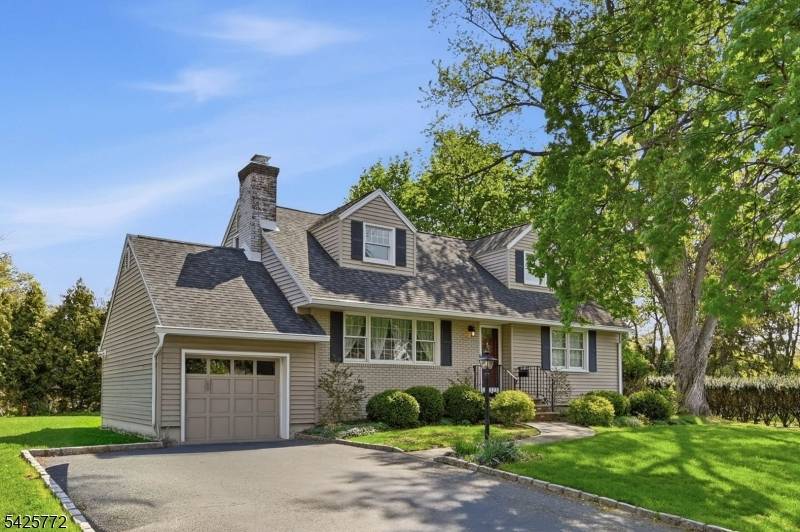 Welcome to this well maintained, dormered Cape Cod that perfectly blends charm w essential modern updates.