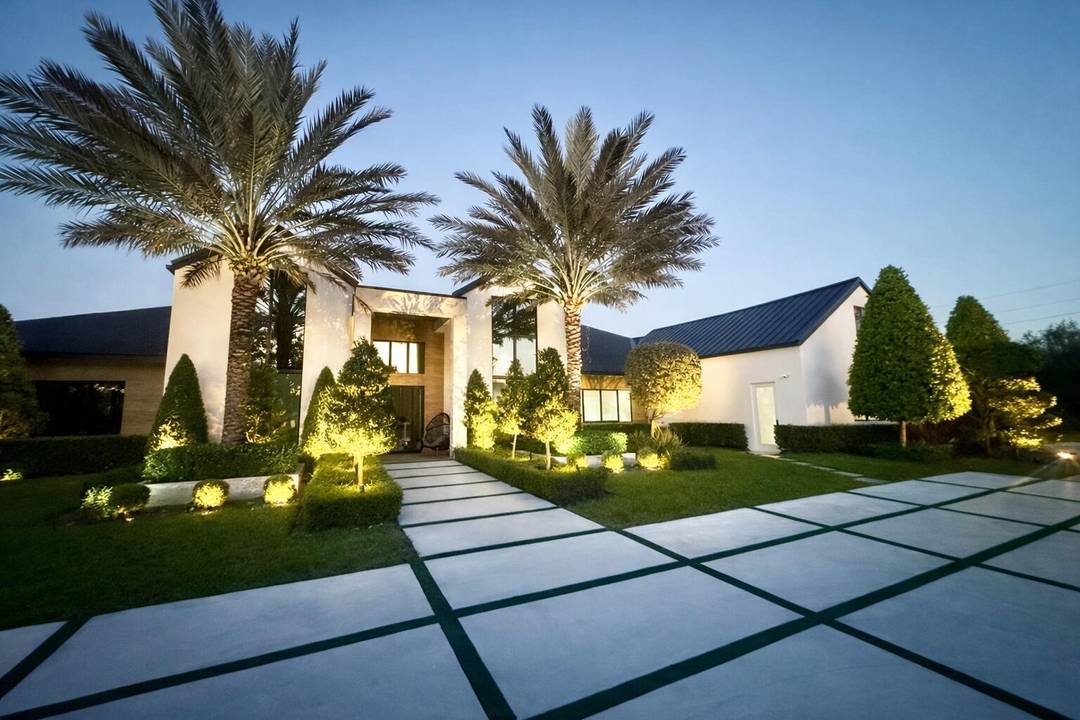 Luxurious Private Estate New Construction 2025 Turn Key, Low Maintenance Living Set on A nearly 2 acre high and dry agricultural estate lot fully surrounded by a concrete wall, this ...