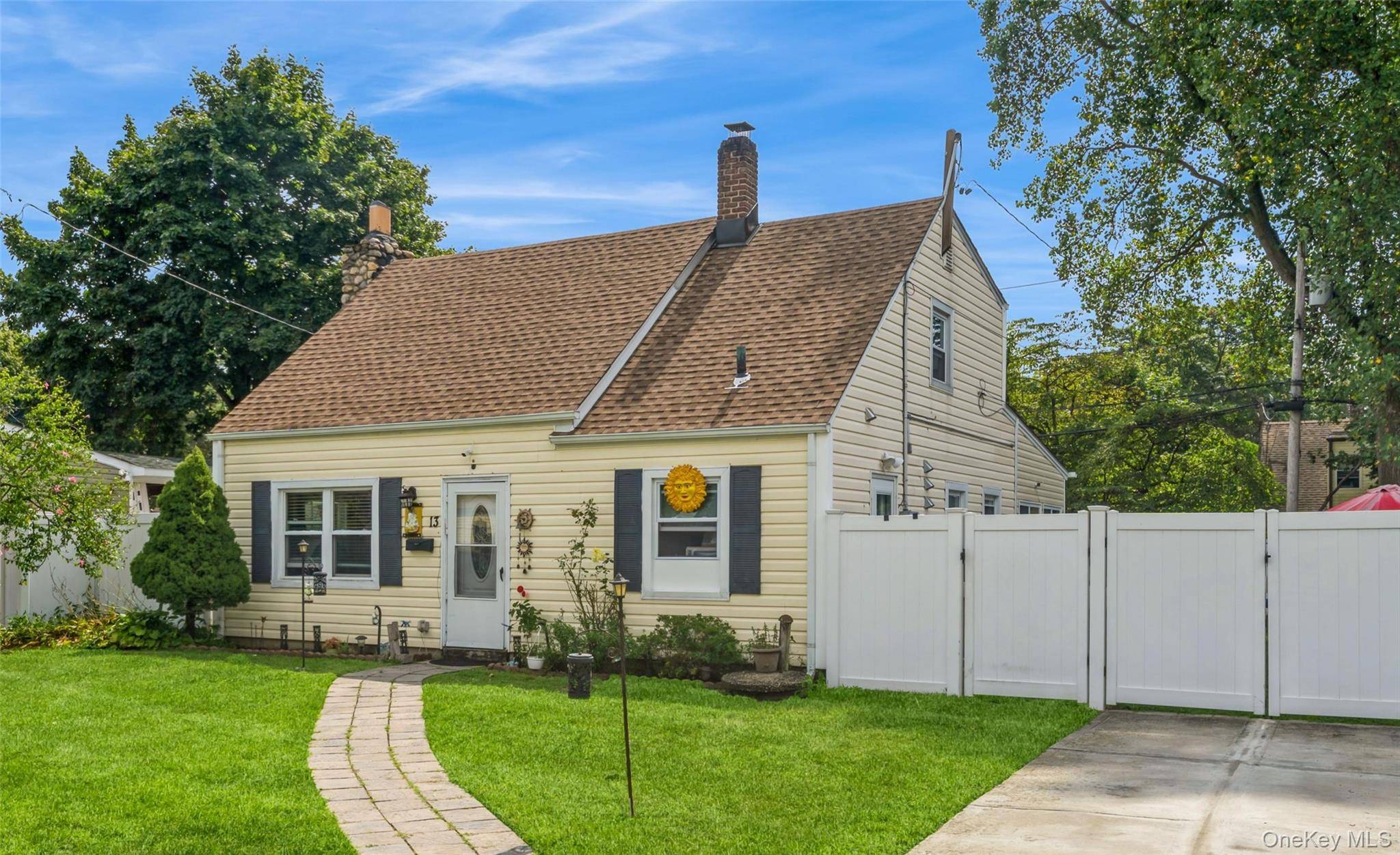 Welcome to this beautiful turn key expanded Cape, tucked away on a quiet dead end street in Westbury.