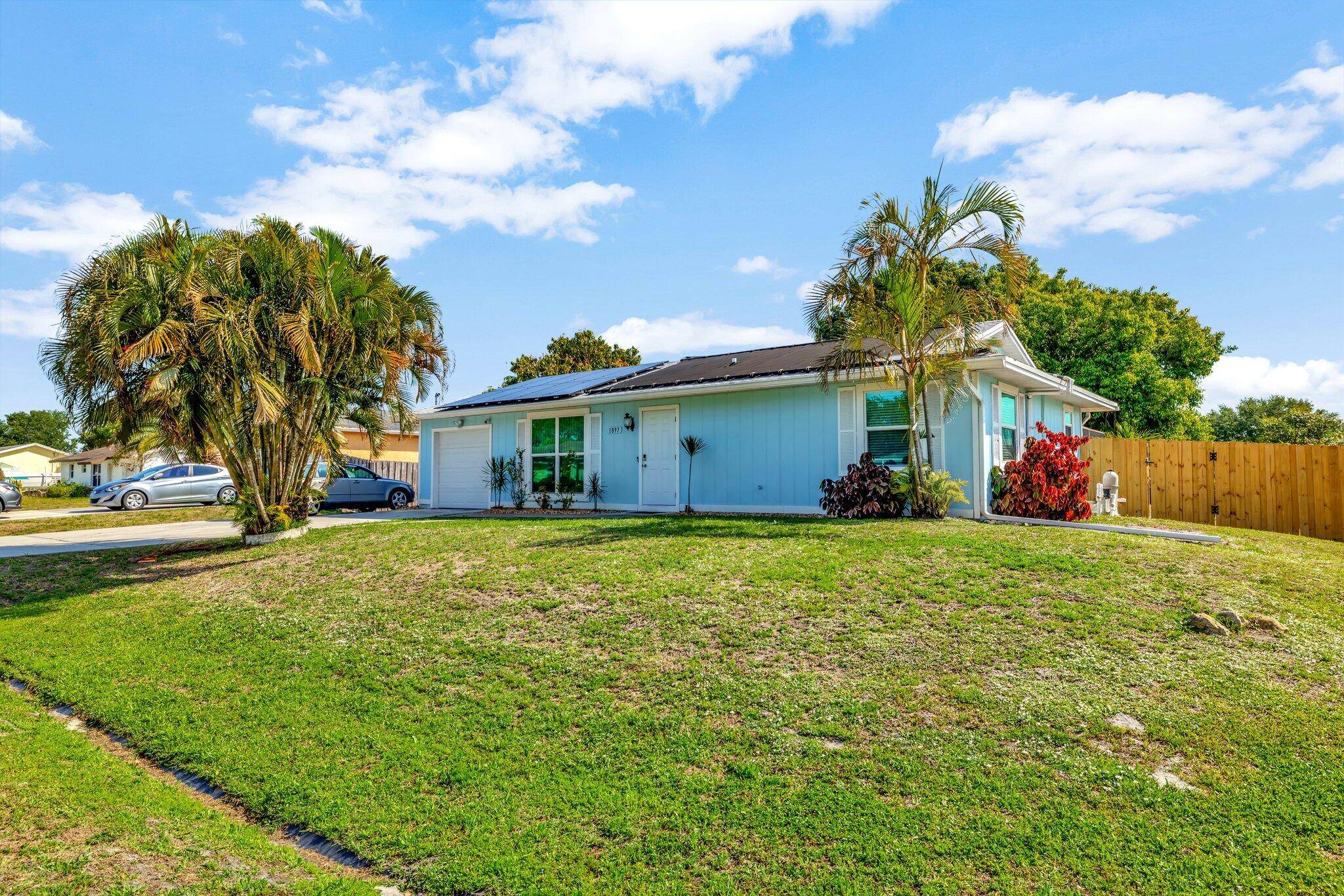 Beautifully updated 2 bed, 2 bath pool home on a corner lot with a 1 car garage in the heart of Port St.