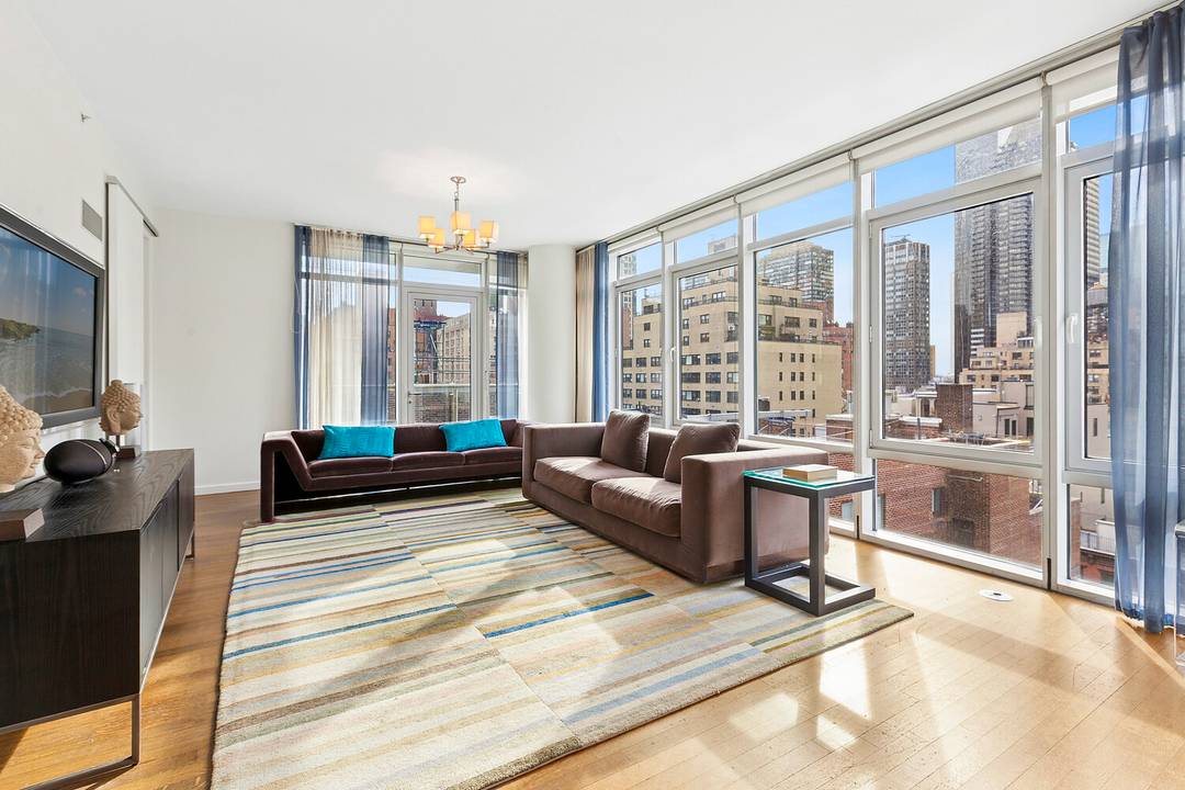 Sprawling, sophisticated, and impeccably designed, this stunning fully furnished corner three bedroom, three and a half bath residence offers sweeping skyline views, dual private terraces, and a seamless, light filled ...