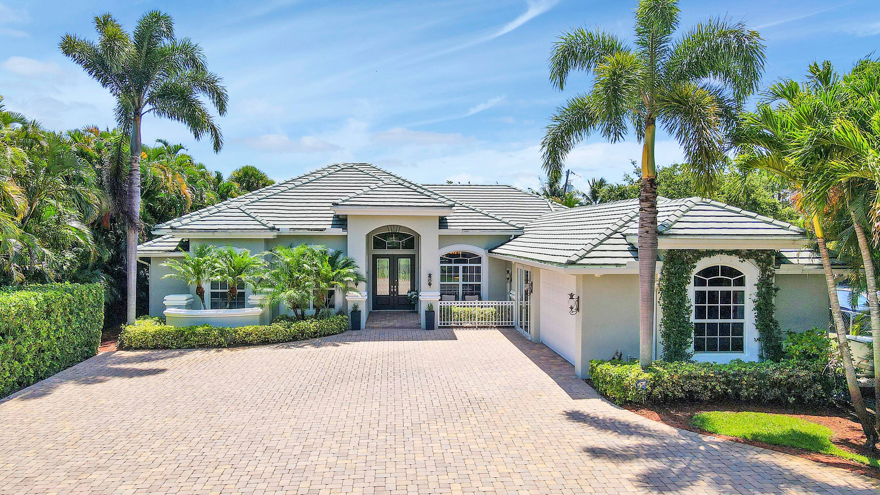 Flip a coin into the wishing well on your arrival as this riverfront dream just might come true !