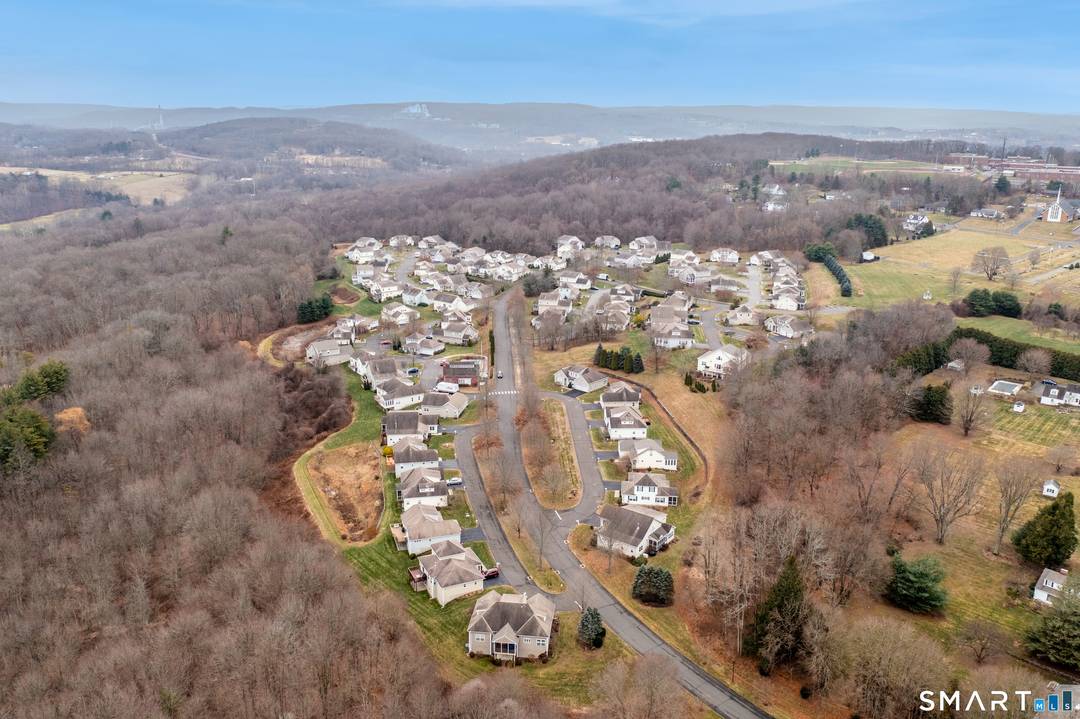 Wonderful Bartlett Hill Home set in the best location near the pool and backing up to acres of woods.