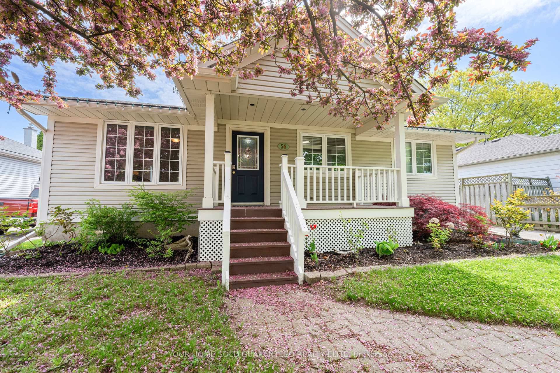OVERSIZED 6 BEDROOM BUNGALOW WITH GREAT ROOM ADDITION amp ; HEATED GARAGE ON AN EXTRA DEEP LOT !