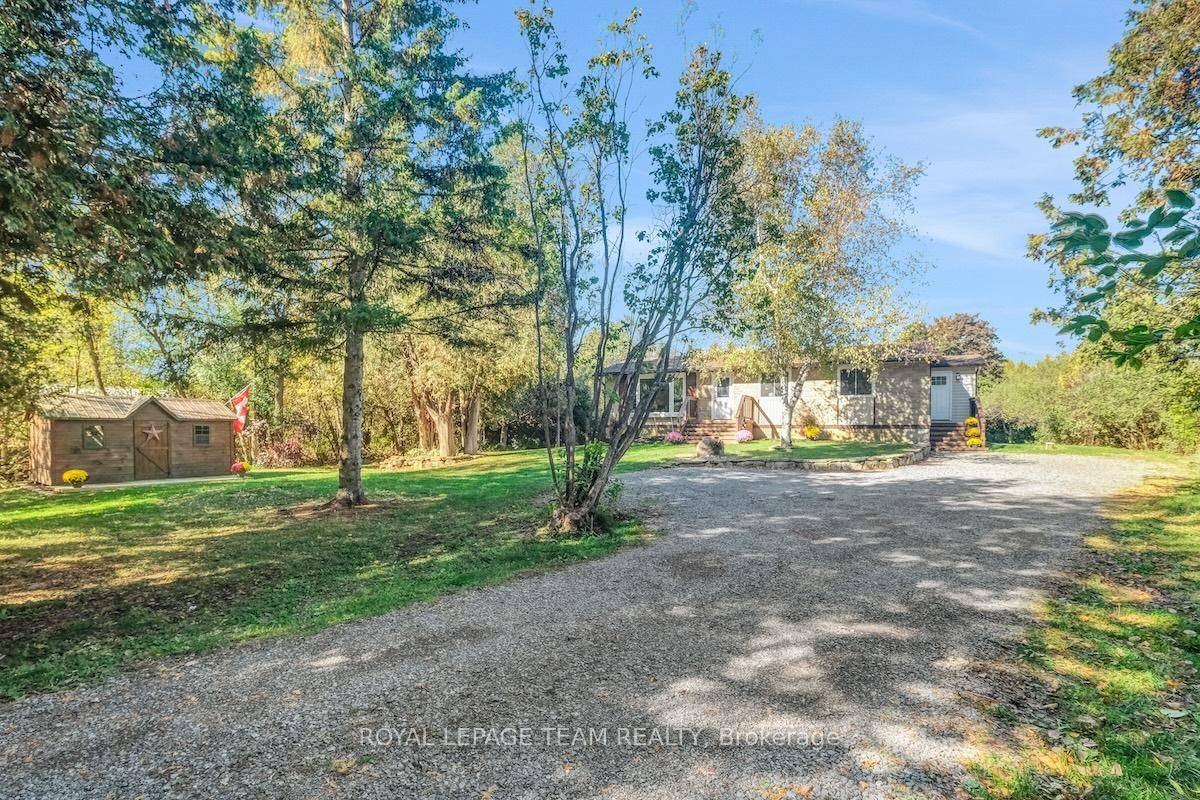 Beautiful 1. 6 acre wooded property offering the perfect balance of privacy and convenience.
