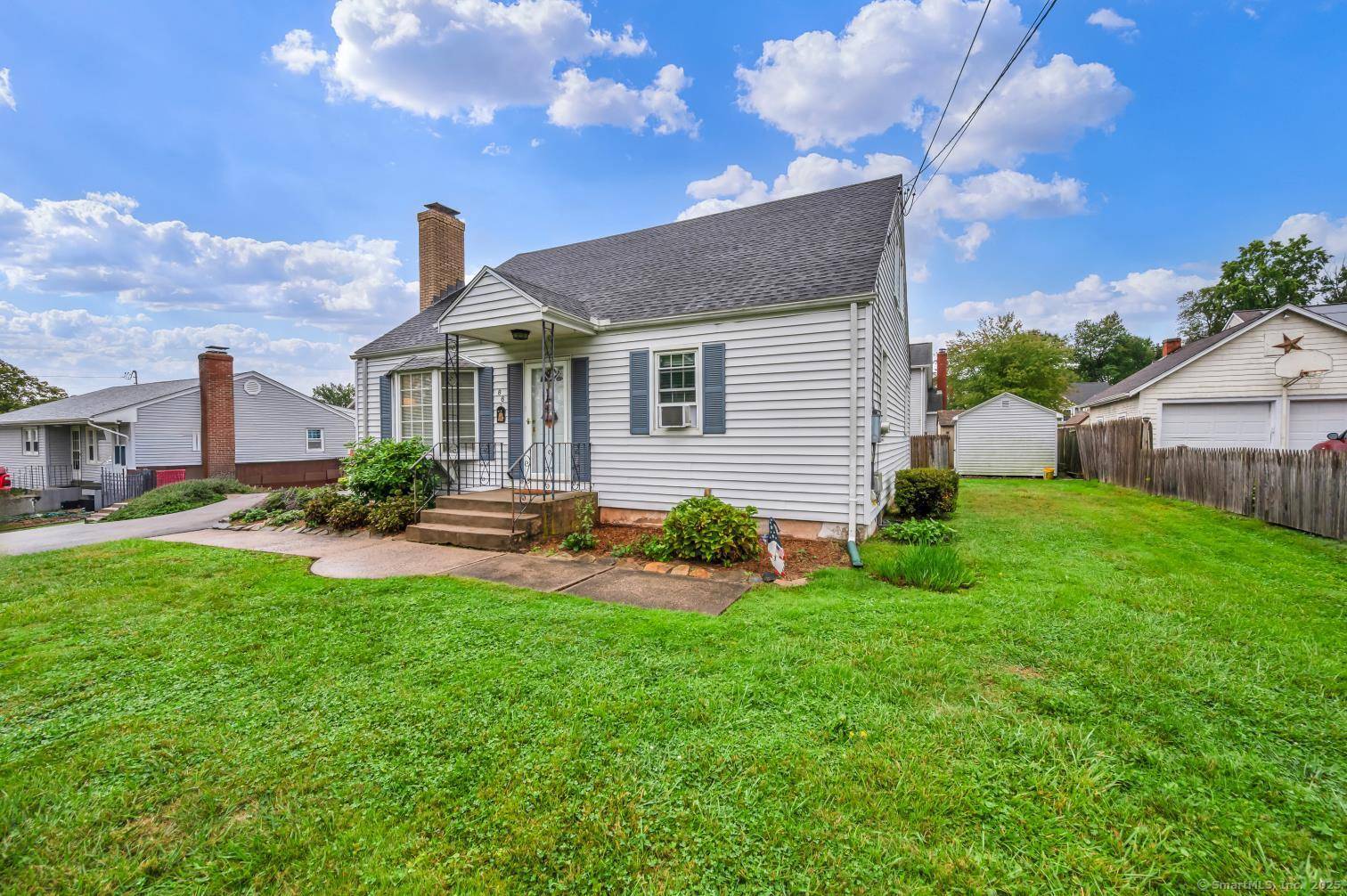 FALL in love with this beautifully maintained Cape Cod in the heart of Wethersfield !