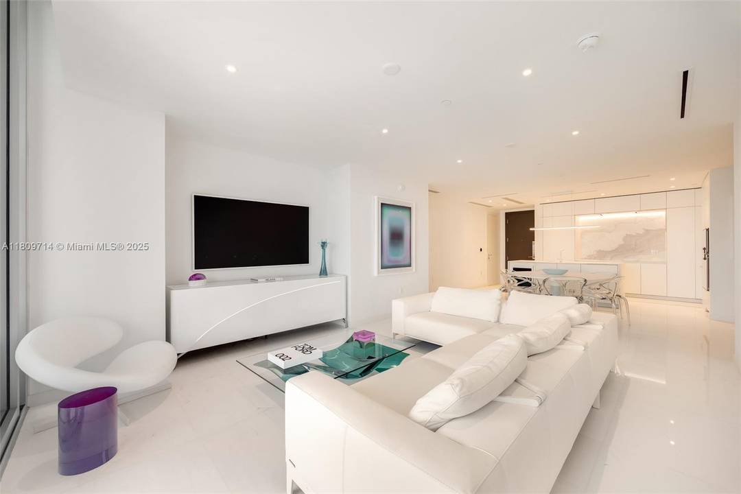 Rising 52 stories above Miami, this move in ready 1, 699 SF residence redefines luxury with panoramic views of the ocean, bay, and skyline.