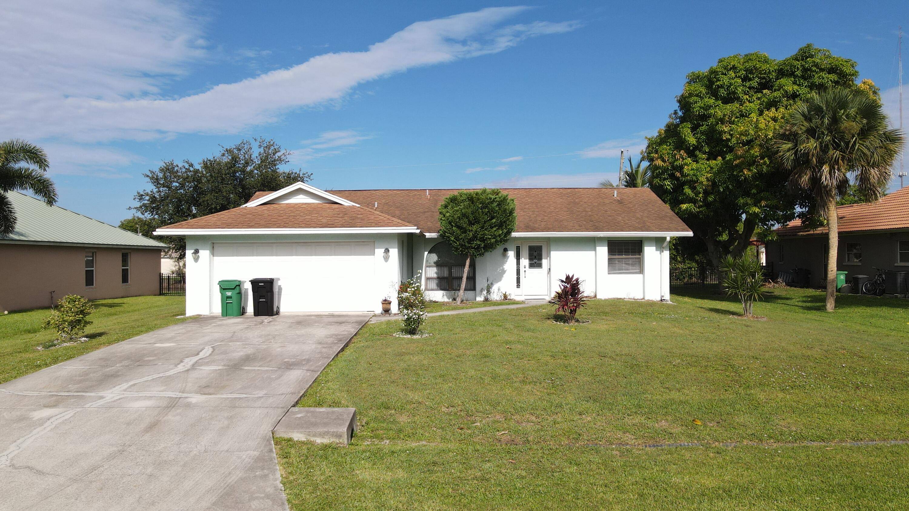 This gem on Florida's Treasure Coast offers strong curb appeal on a.