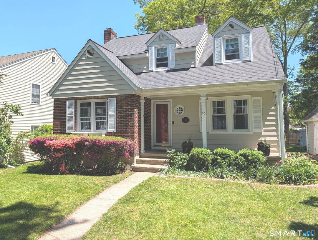 This storybook cape with front porch is set on nearly one third of an acre and is conveniently located to everything !