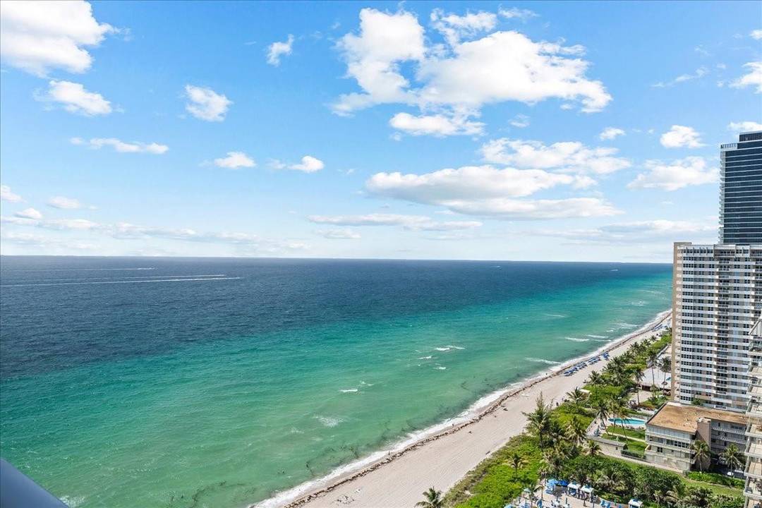 Step into beachfront luxury in this expansive 3 bed 3 bath penthouse with bonus office storage room in the best line at La Mer.