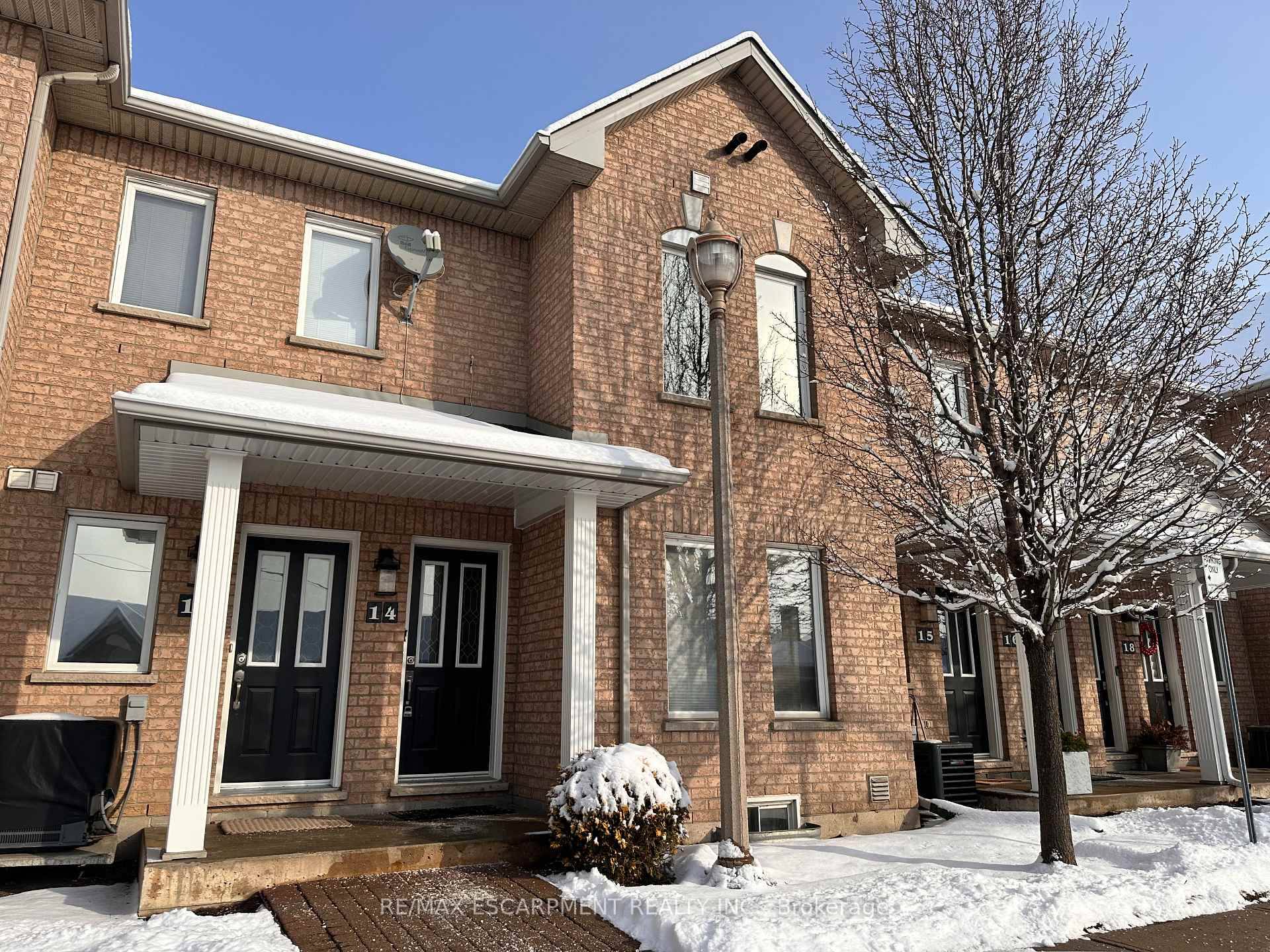 Bright and beautiful stacked town in the sought after Fifty Point waterfront neighbourhood.
