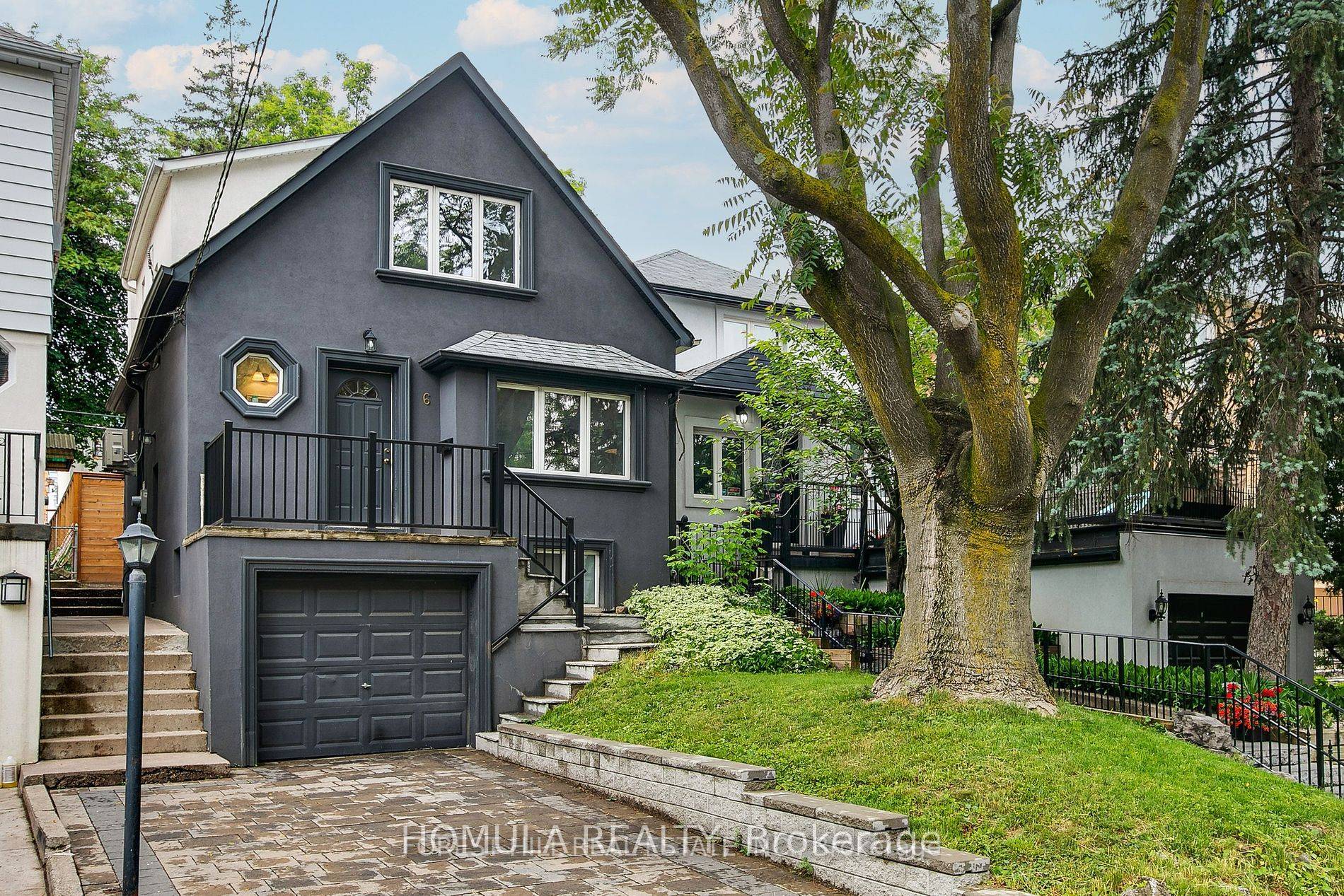 Charming detached home with built in garage and private driveway in high demand Midtown location.